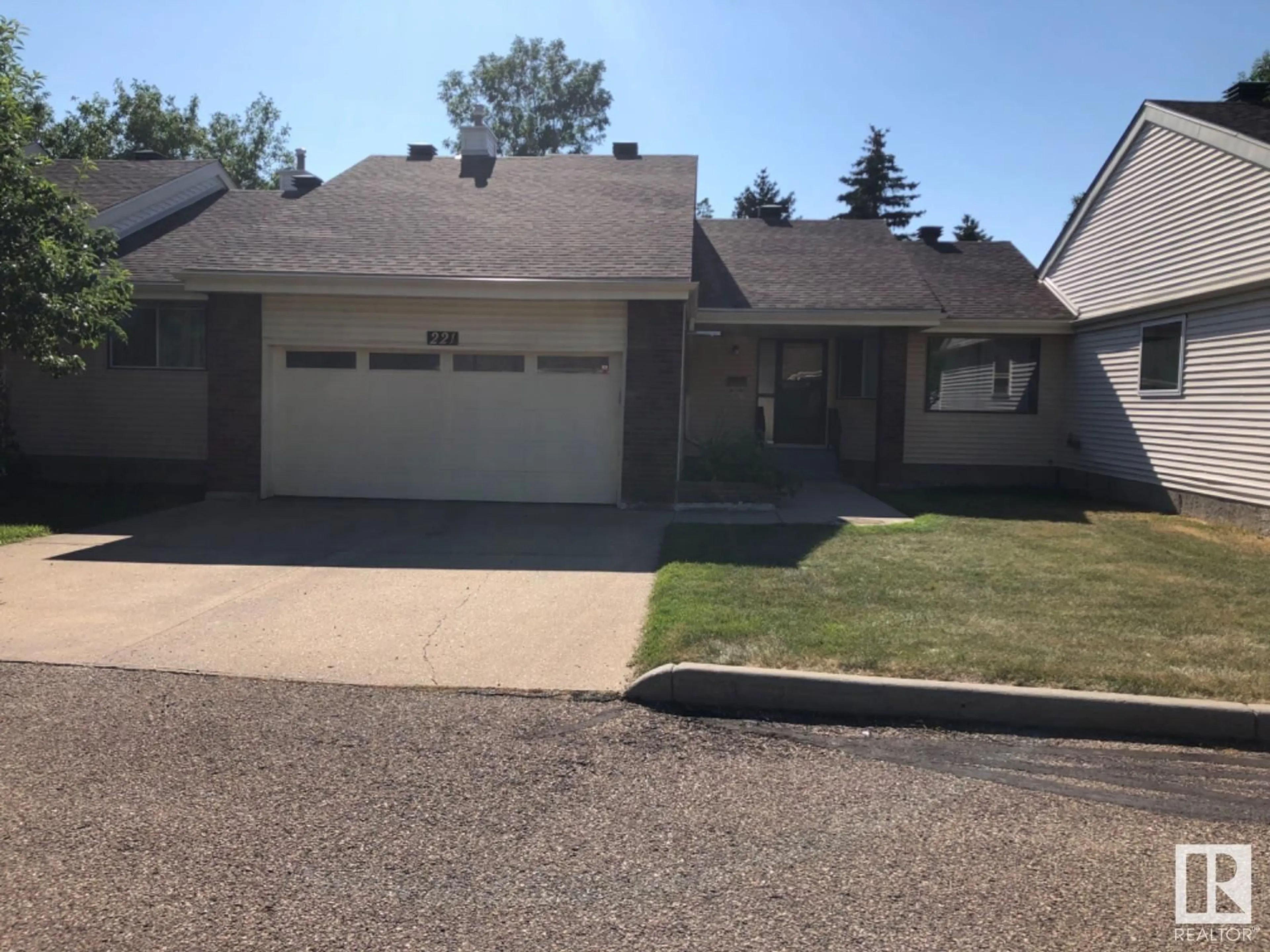 Frontside or backside of a home for 221 OEMING RD NW, Edmonton Alberta T6R1M2