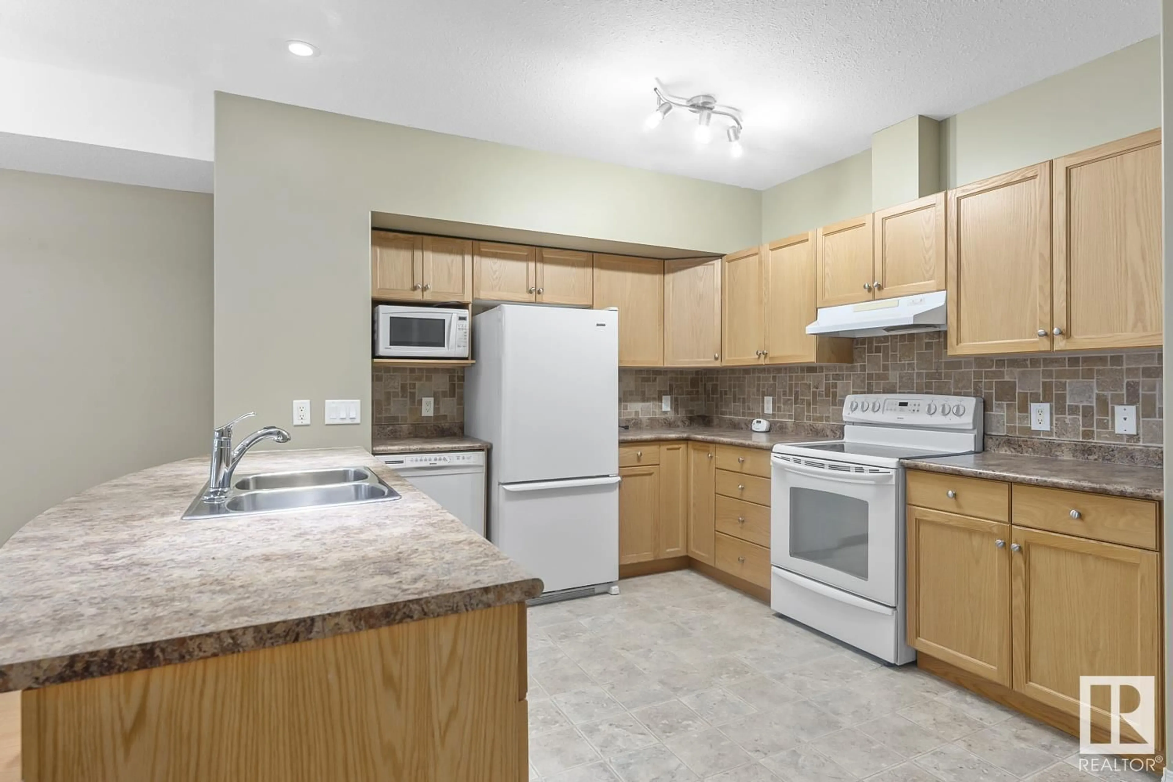 Standard kitchen, wood floors for #105 801 11 ST, Cold Lake Alberta T9M1K2