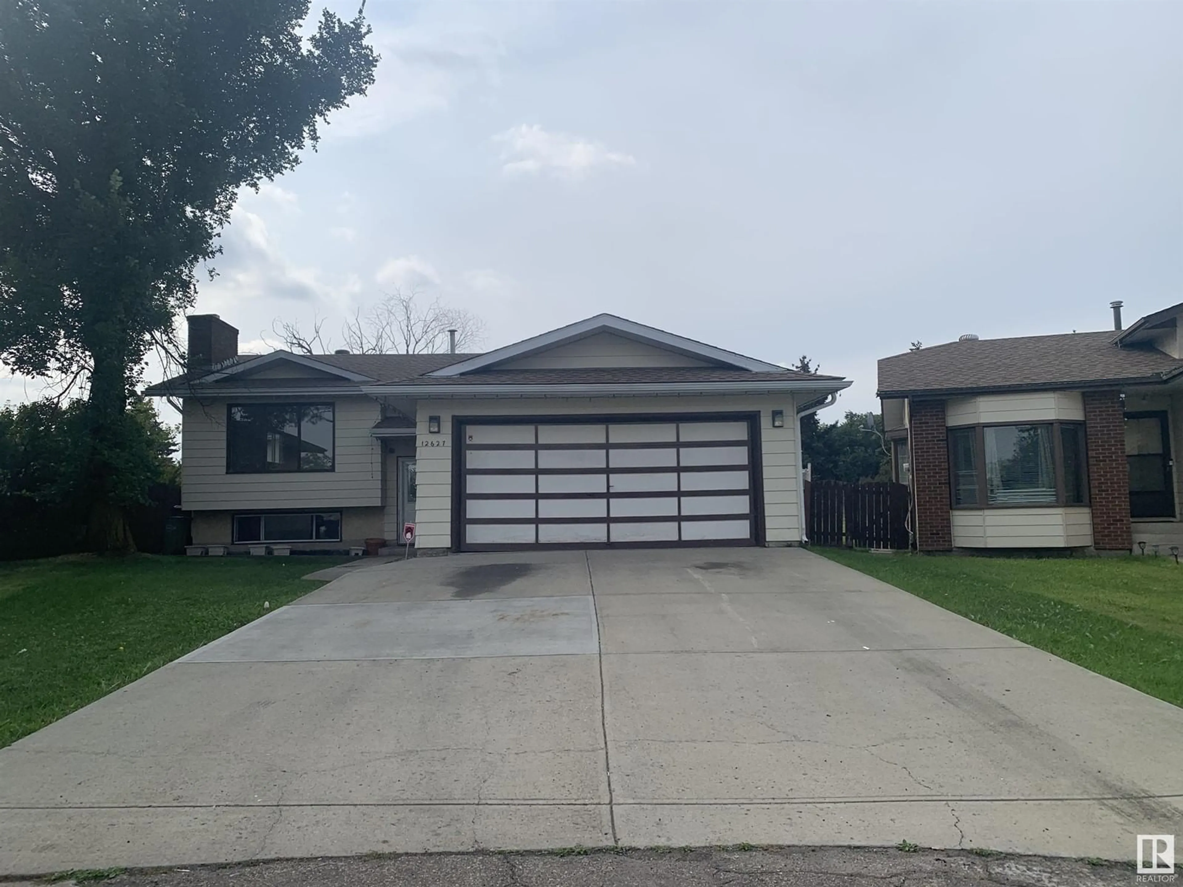 Frontside or backside of a home, the street view for 12627 161 AV NW, Edmonton Alberta T5X4W7