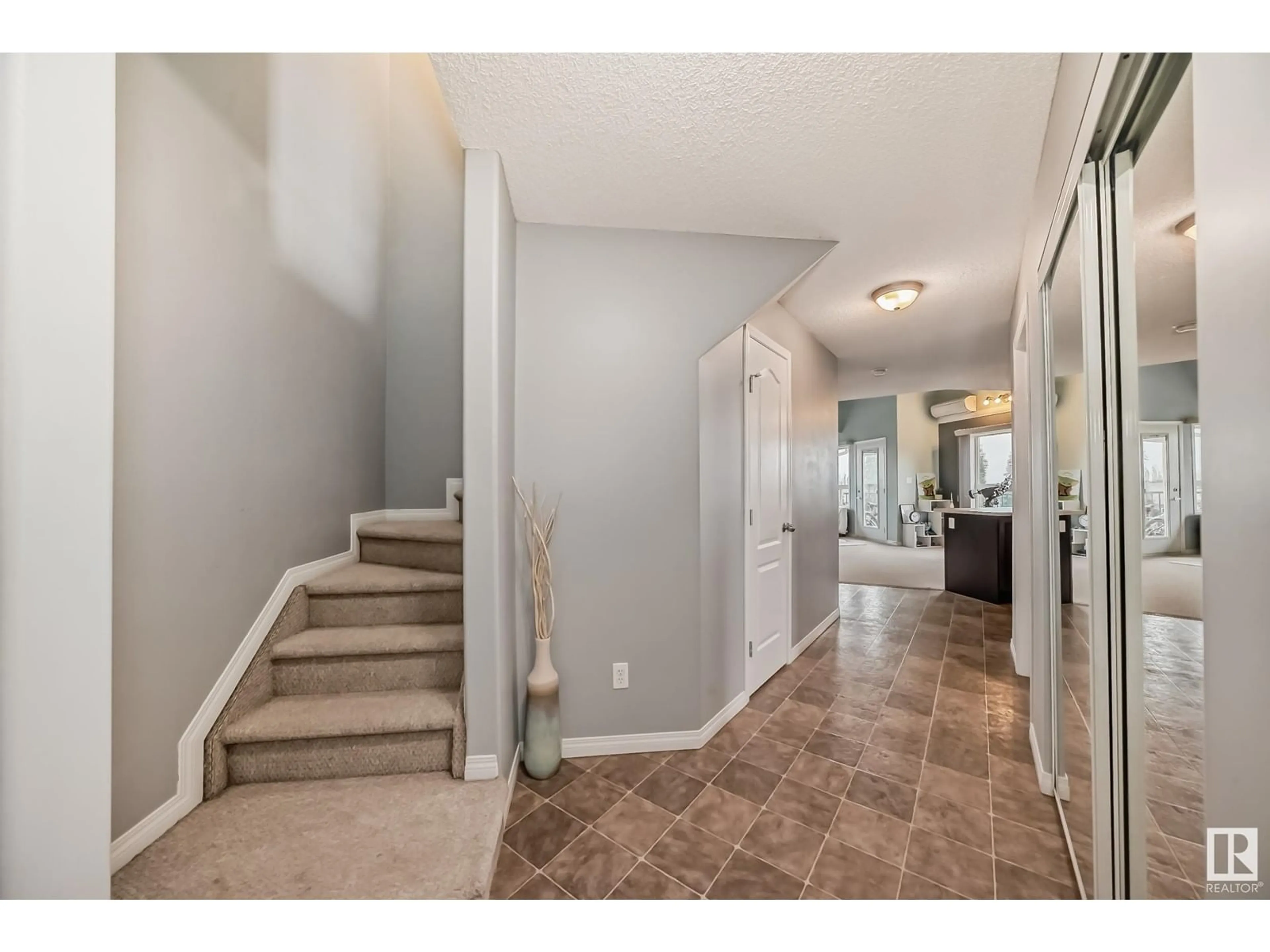 Indoor entryway, wood floors for #426 1520 HAMMOND GA NW, Edmonton Alberta T6M0J4