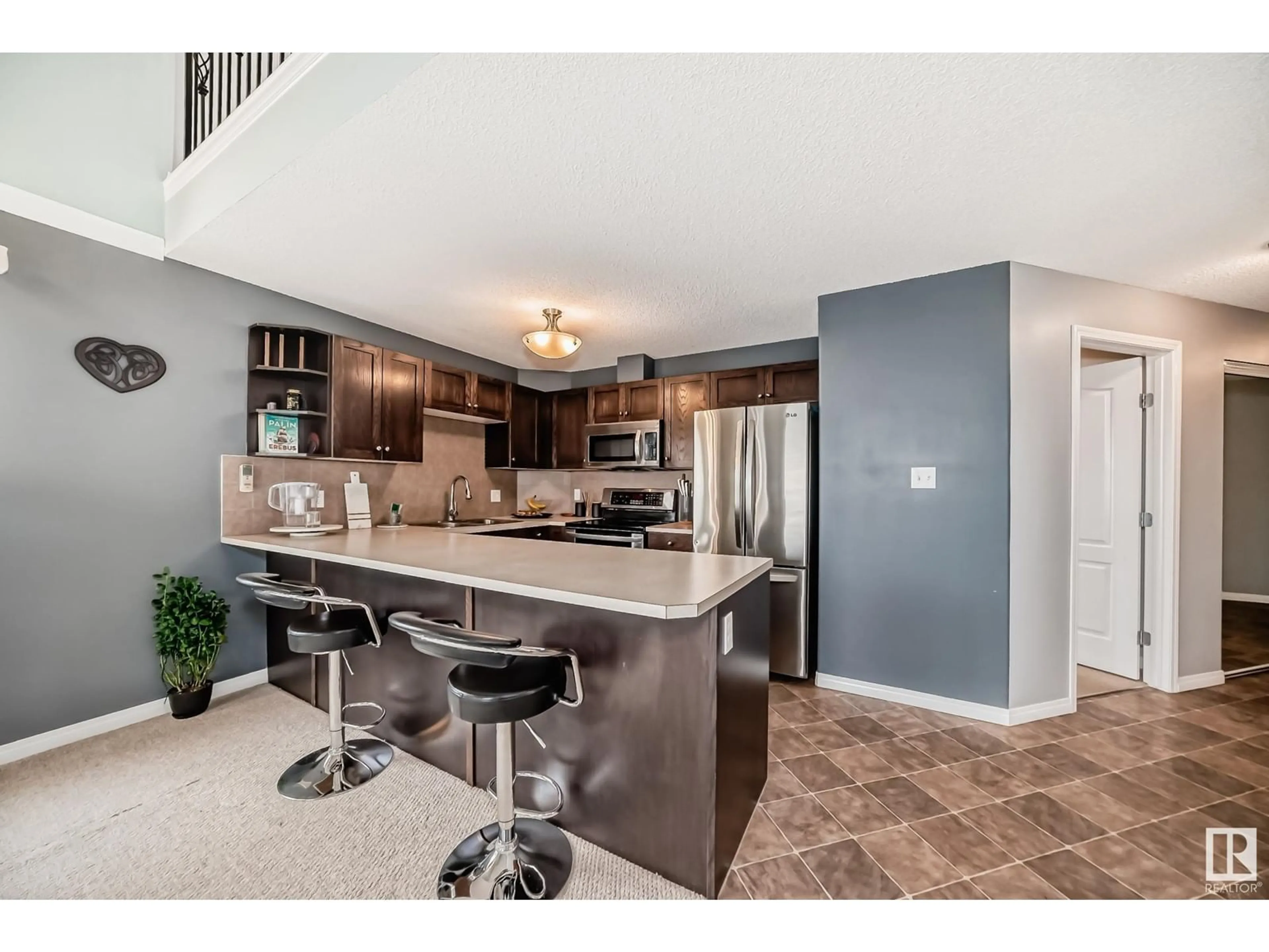 Open concept kitchen for #426 1520 HAMMOND GA NW, Edmonton Alberta T6M0J4