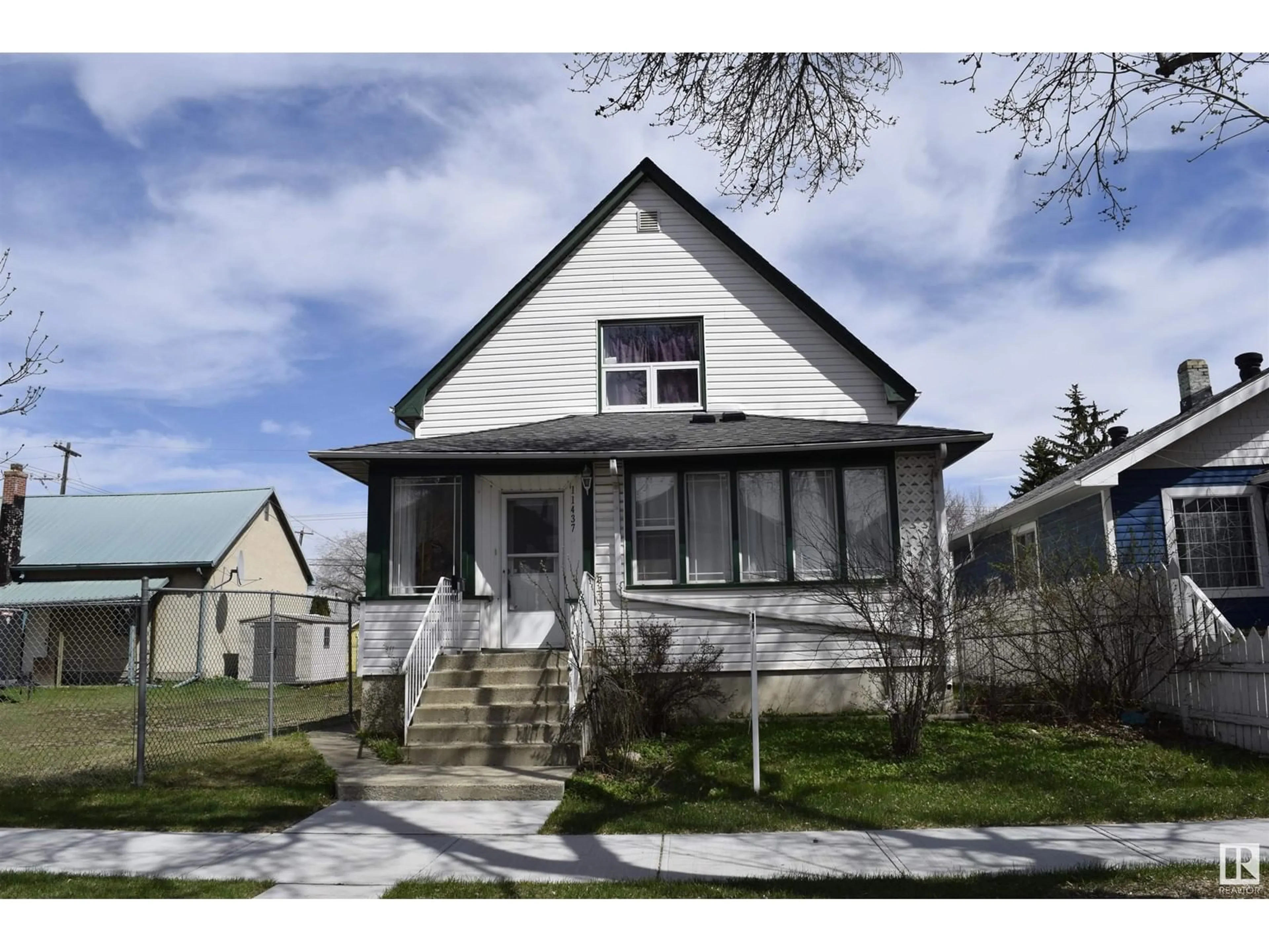 Frontside or backside of a home, the street view for 11437 94 ST NW, Edmonton Alberta T5G1H5