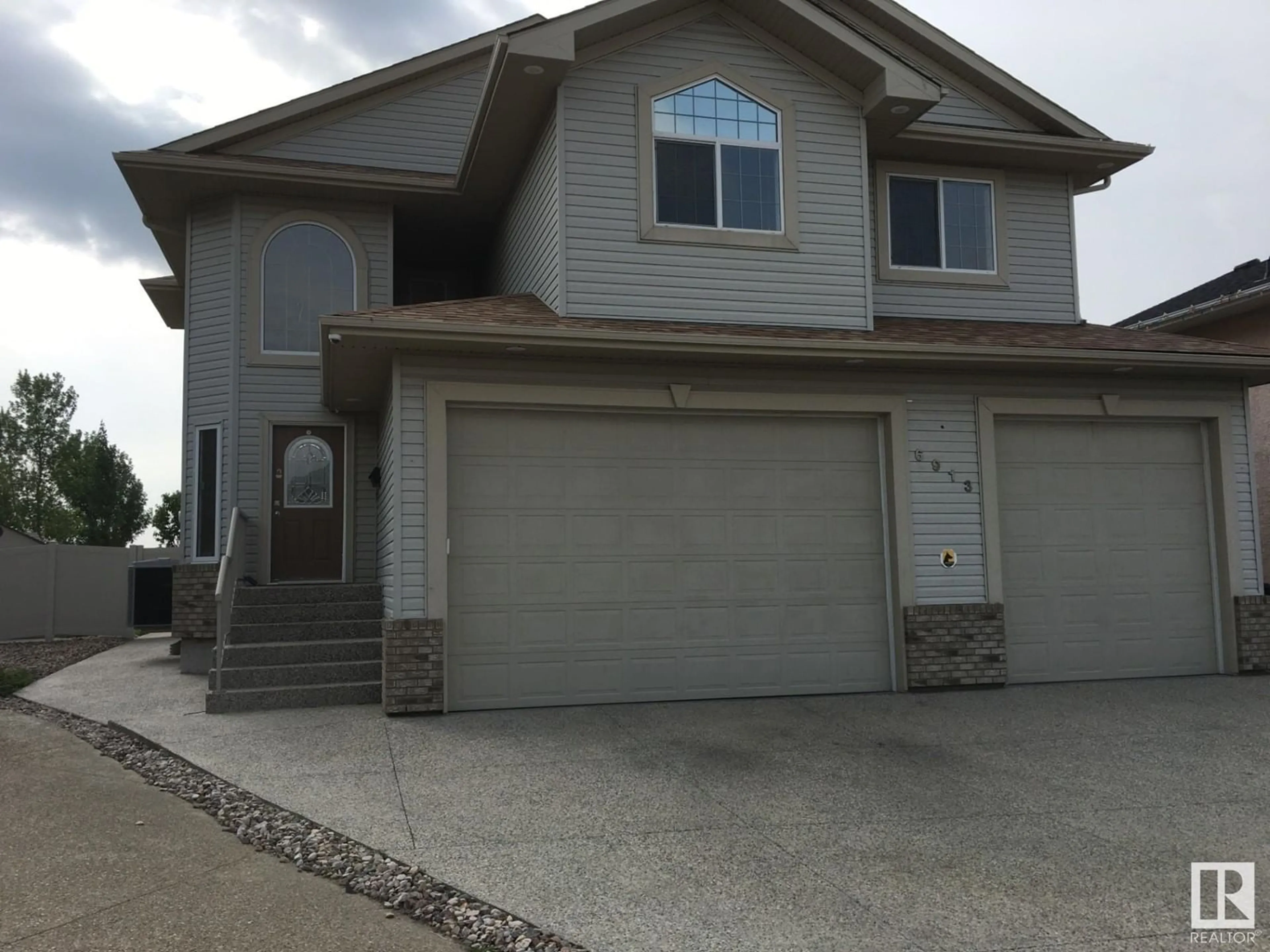 Frontside or backside of a home for 6913 162A AV NW, Edmonton Alberta T5Z3X6