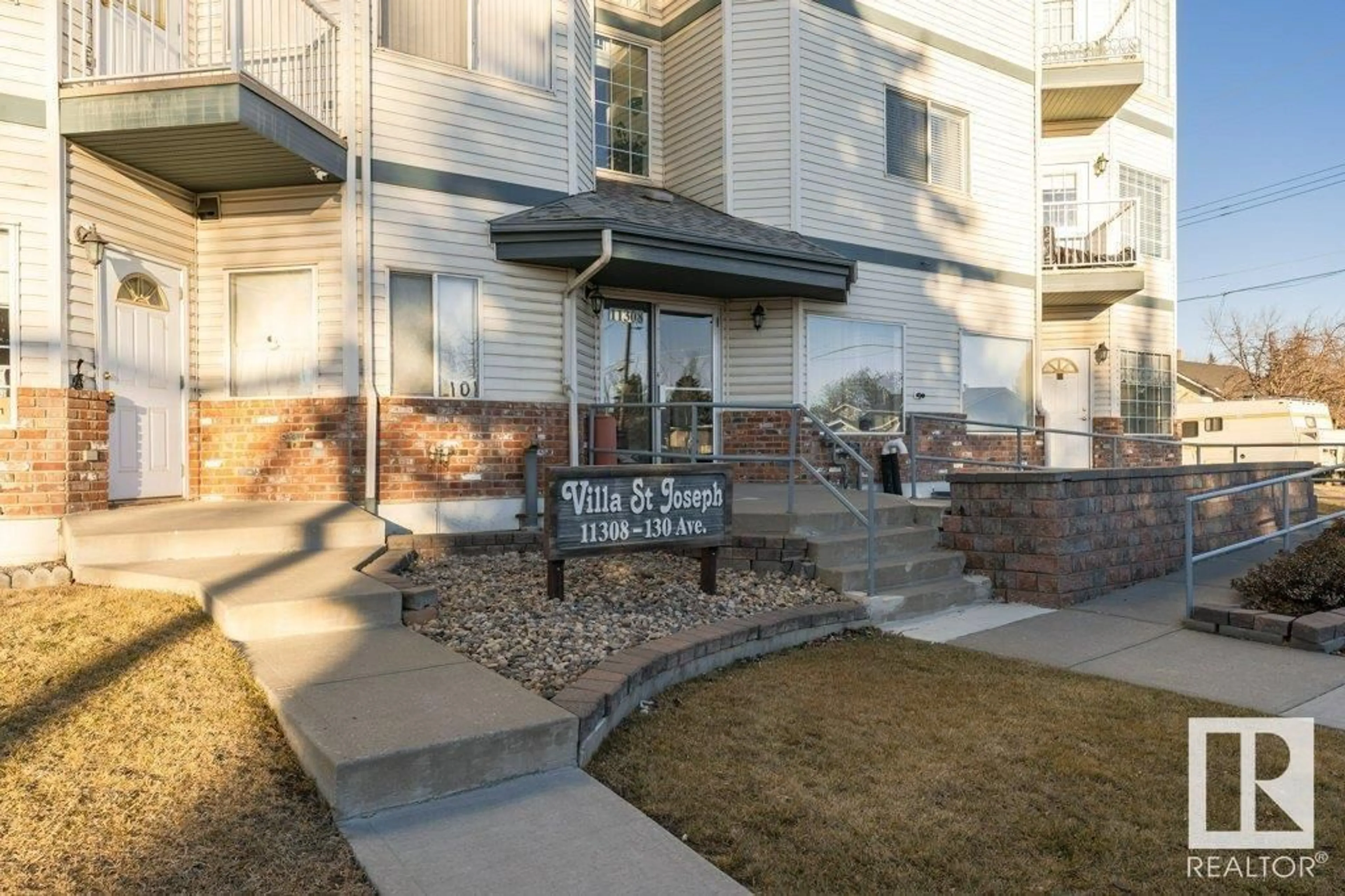 A pic from exterior of the house or condo, the front or back of building for #205 11308 130 AV NW, Edmonton Alberta T5E6L2