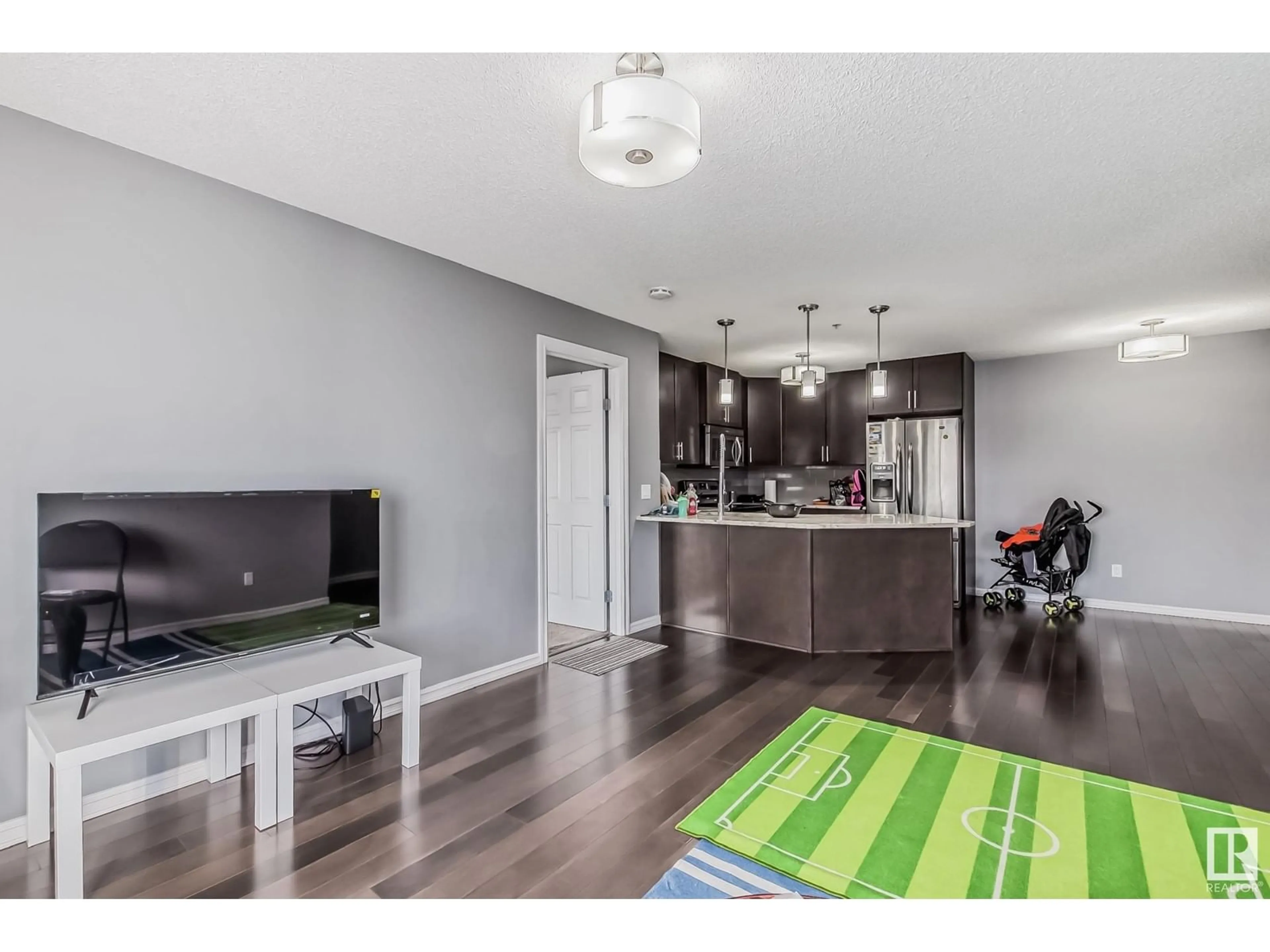 Open concept kitchen for #305 2203 44 AV NW, Edmonton Alberta T6T0T1