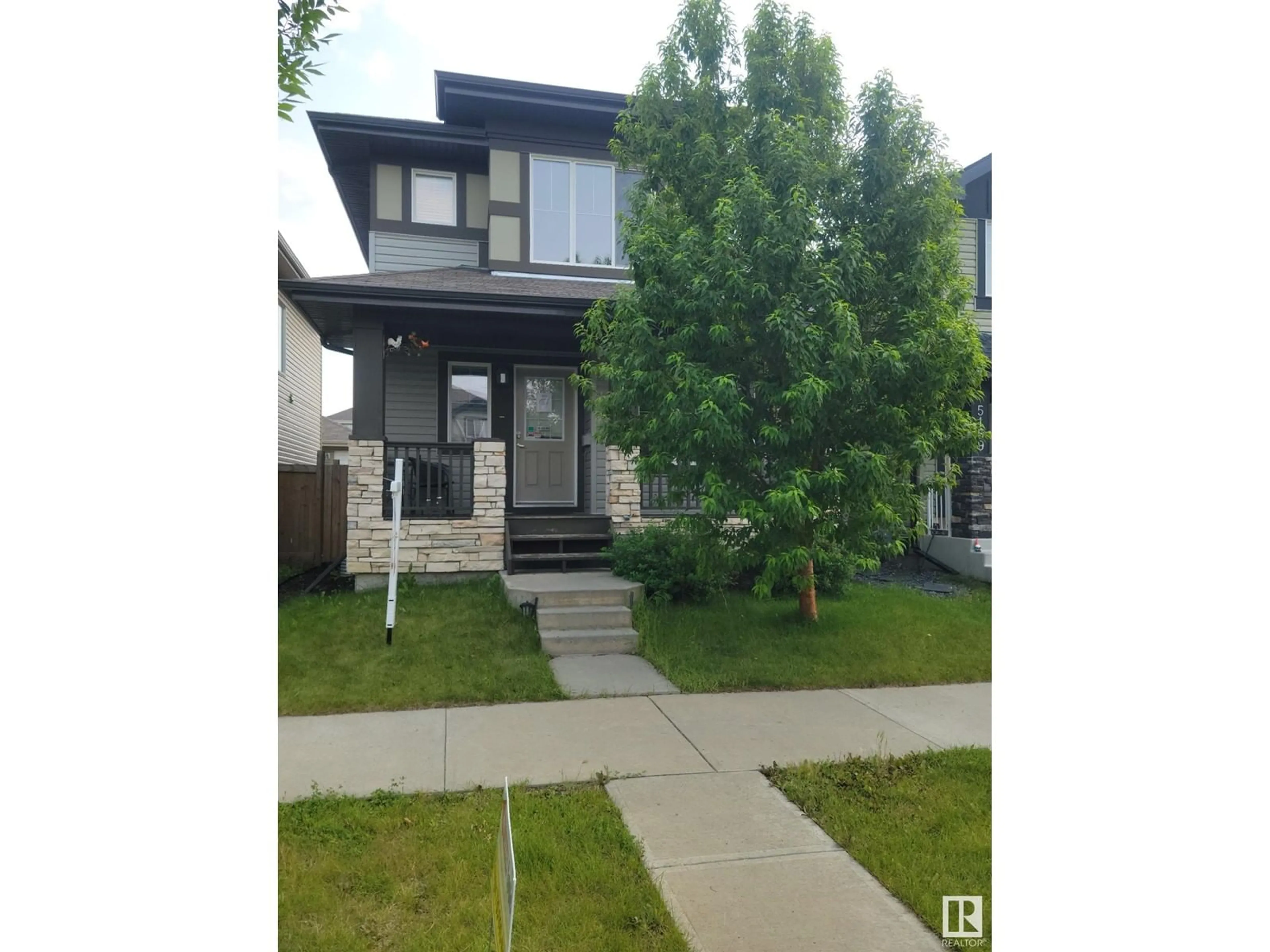 A pic from exterior of the house or condo, the street view for 5155 1A AV SW, Edmonton Alberta T6X0X3