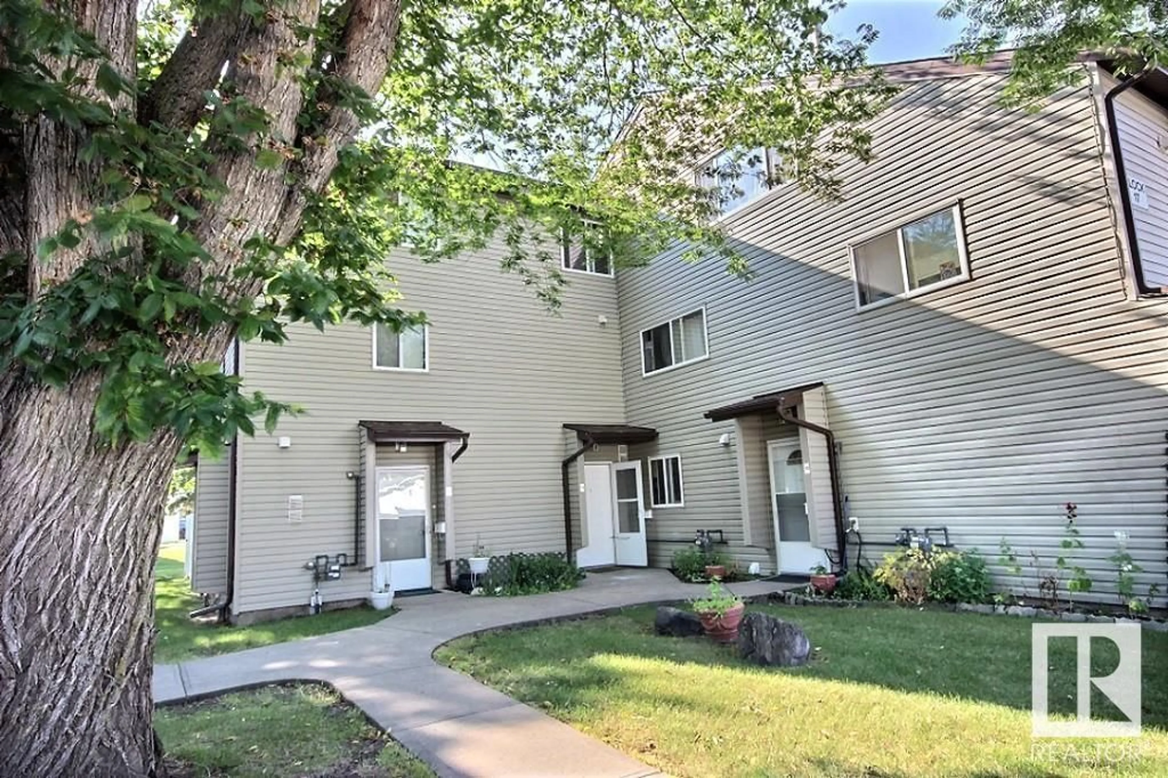 A pic from exterior of the house or condo, the front or back of building for 17B MEADOWLARK VG NW, Edmonton Alberta T5R5X3