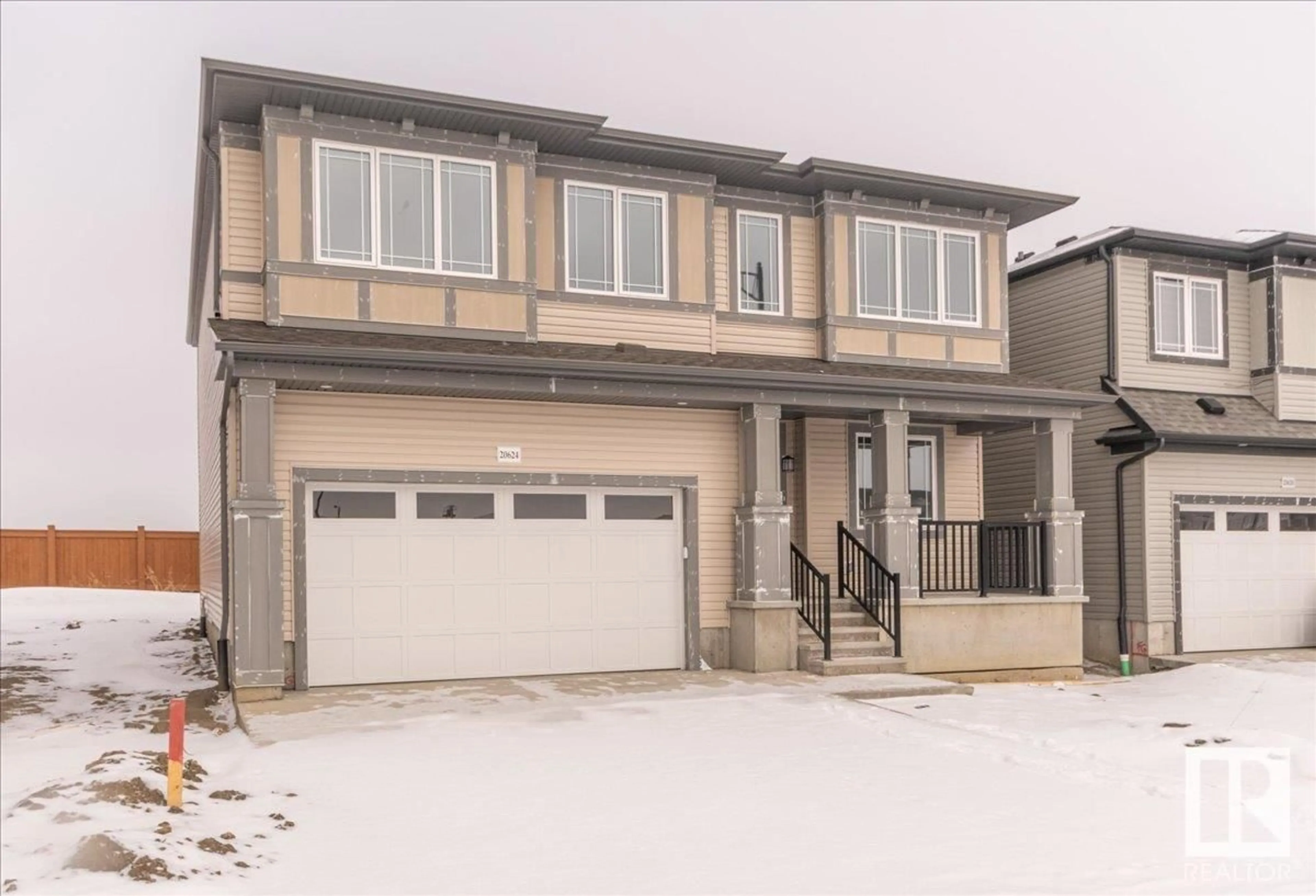 Frontside or backside of a home, the street view for 20624 22 AV NW, Edmonton Alberta T6M1N3