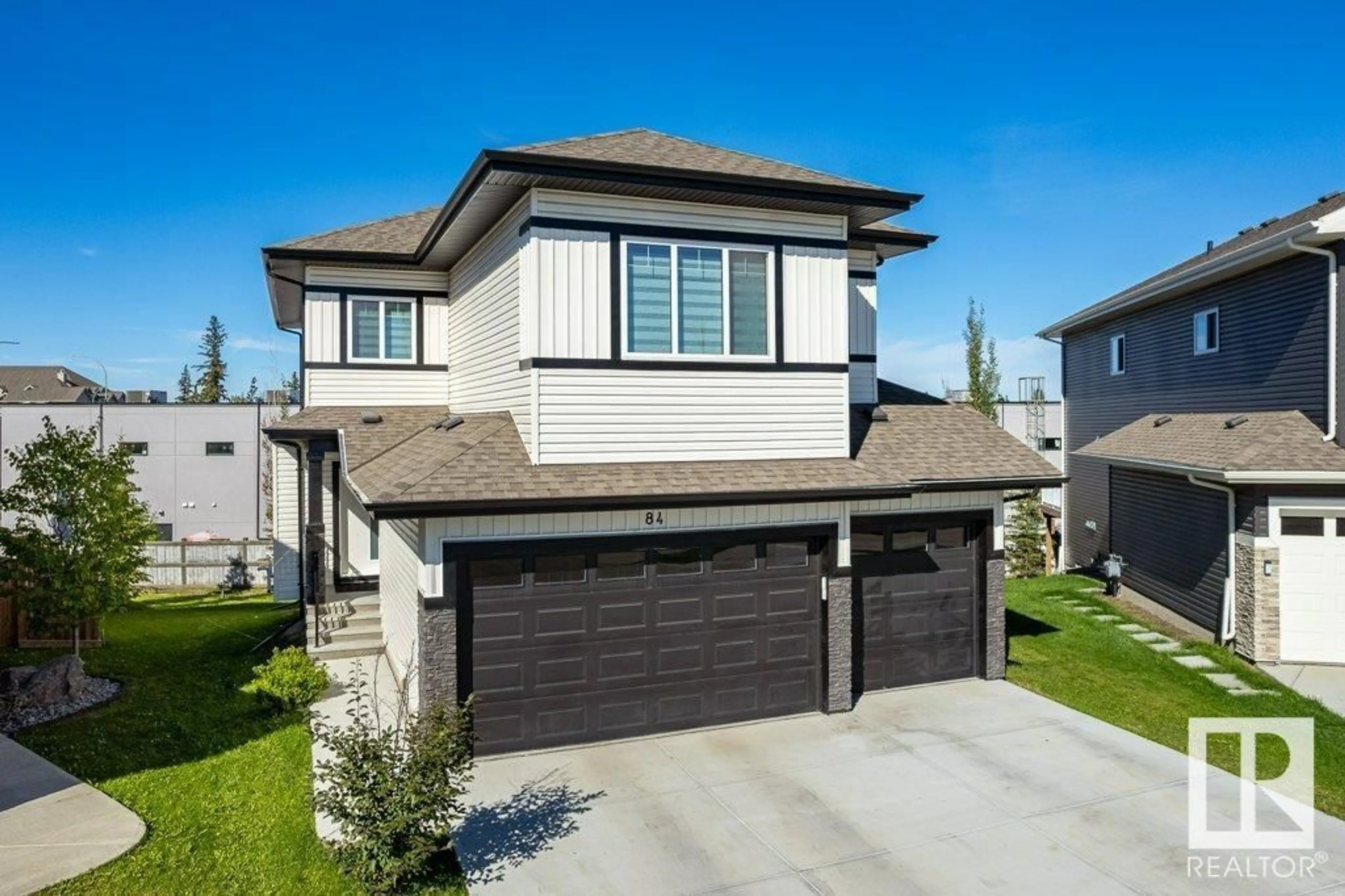 Frontside or backside of a home for 84 MEADOWLAND WY, Spruce Grove Alberta T7X0S4