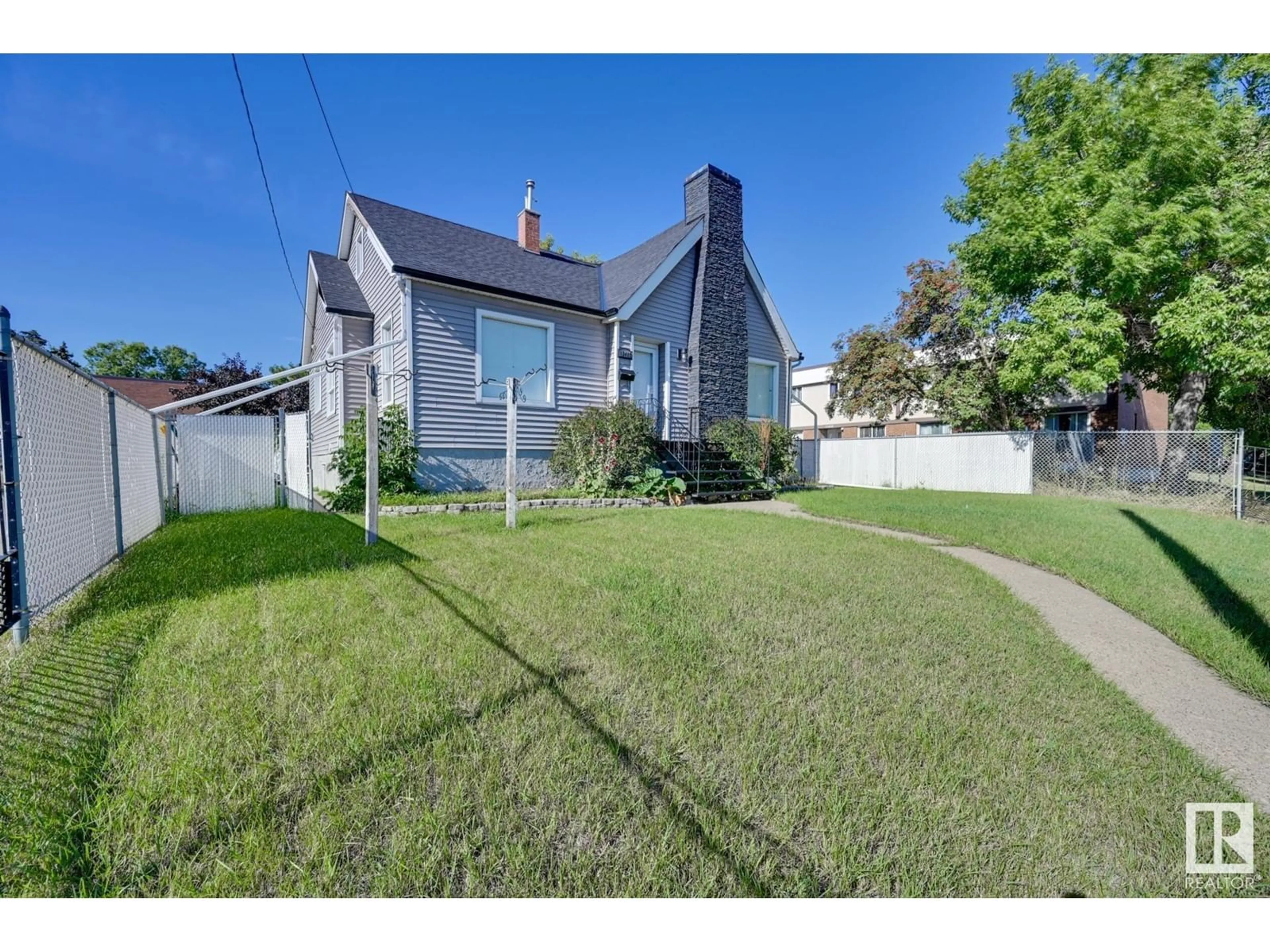 Frontside or backside of a home for 13412 FORT RD NW, Edmonton Alberta T5A1C5