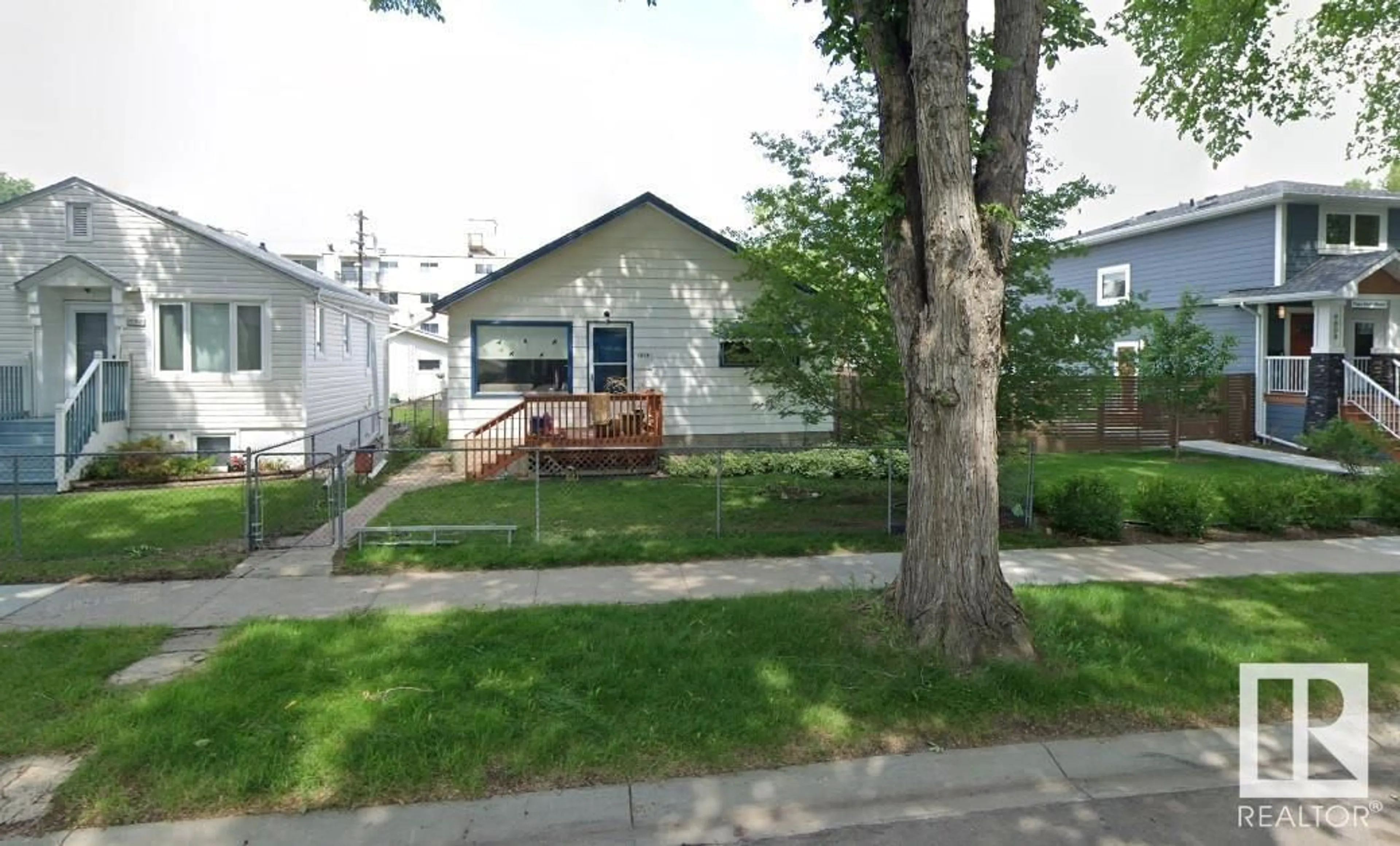 Frontside or backside of a home, the street view for 9818 81 AV NW, Edmonton Alberta T6E1W3