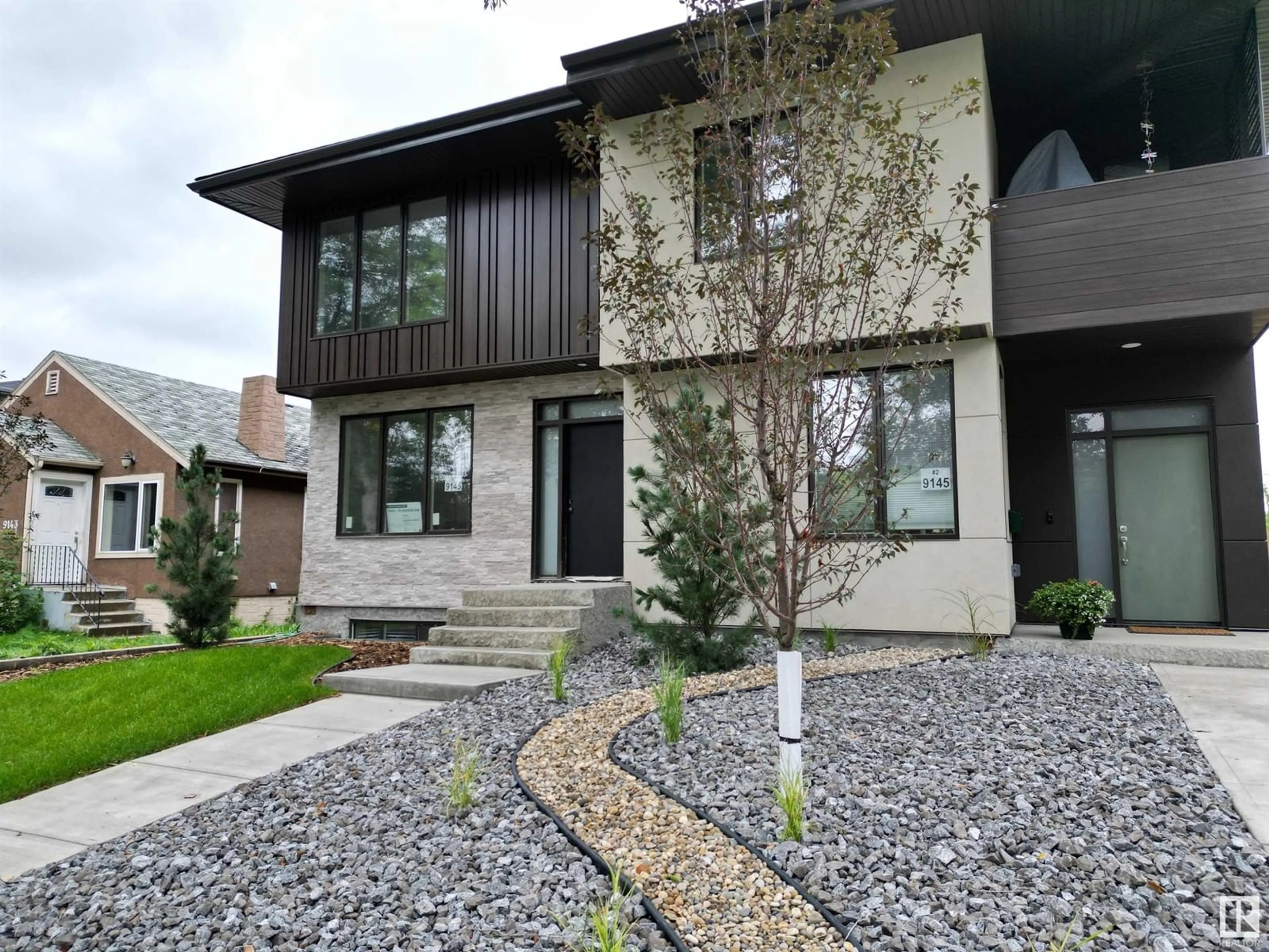 Frontside or backside of a home for #1 9145 78 AV NW, Edmonton Alberta T6C0N9