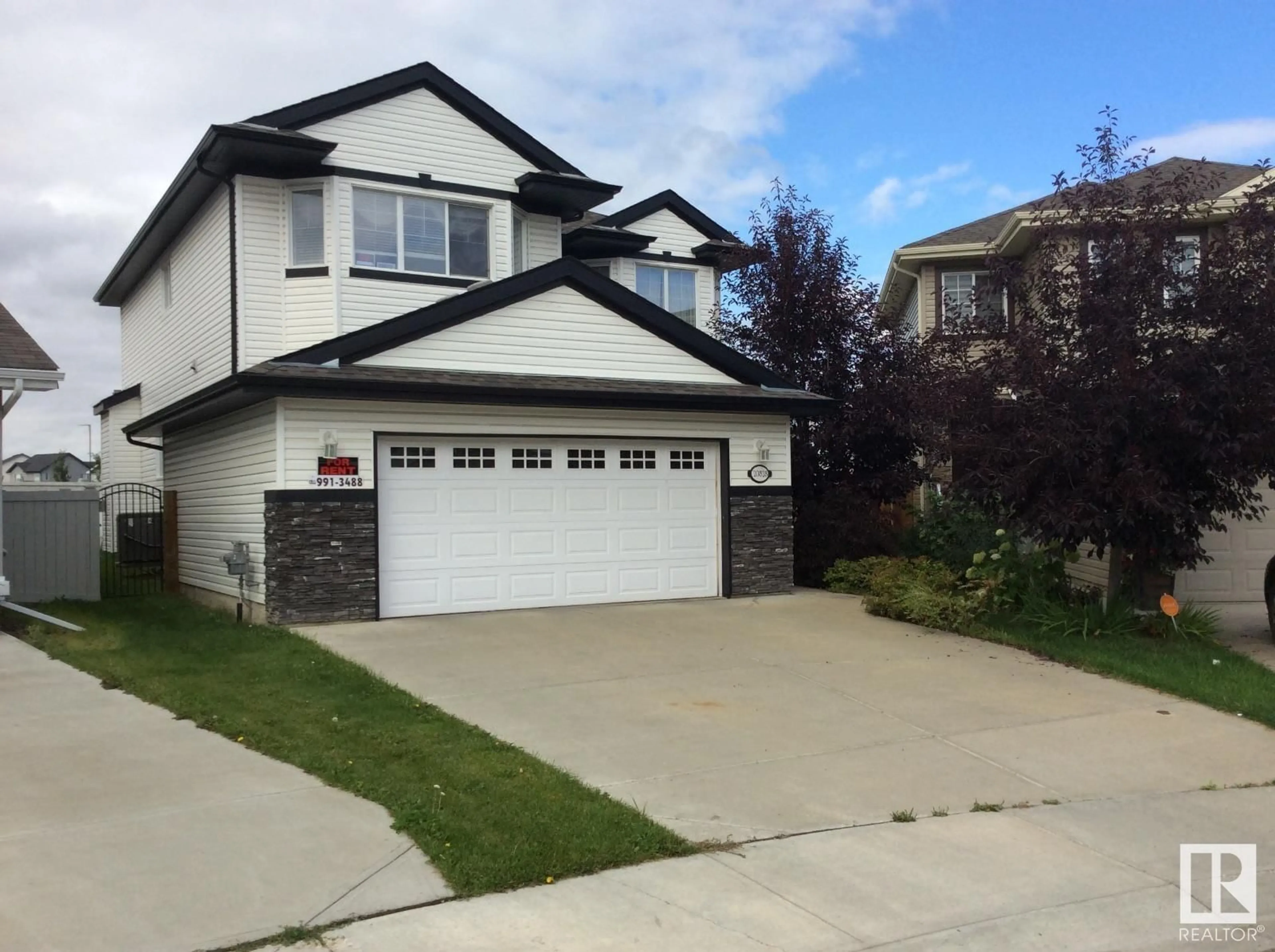 Frontside or backside of a home, the street view for 20828 61 AV NW, Edmonton Alberta T6M0M1