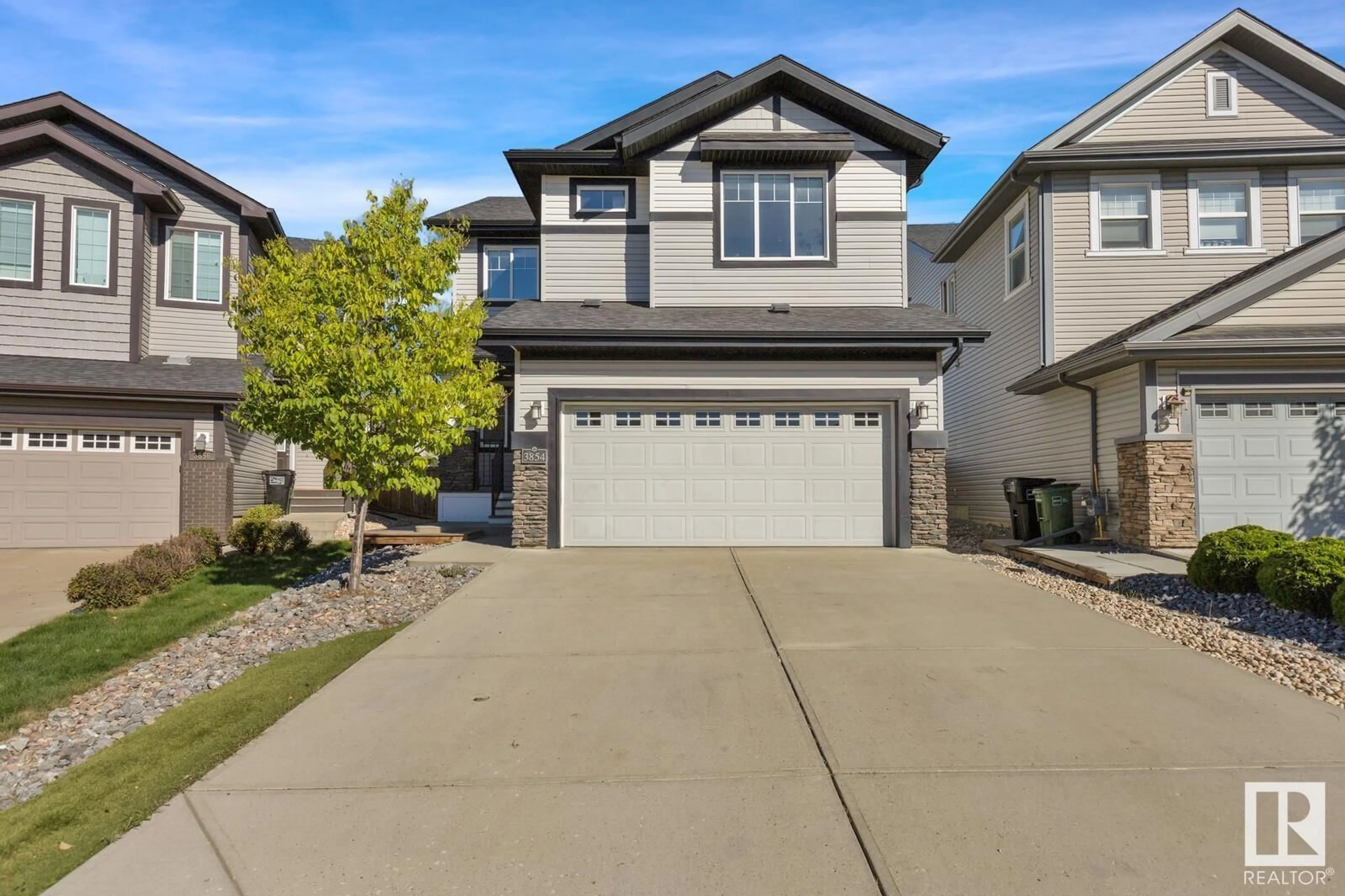 Frontside or backside of a home, the street view for 3854 AGAR GR SW, Edmonton Alberta T6W0W9