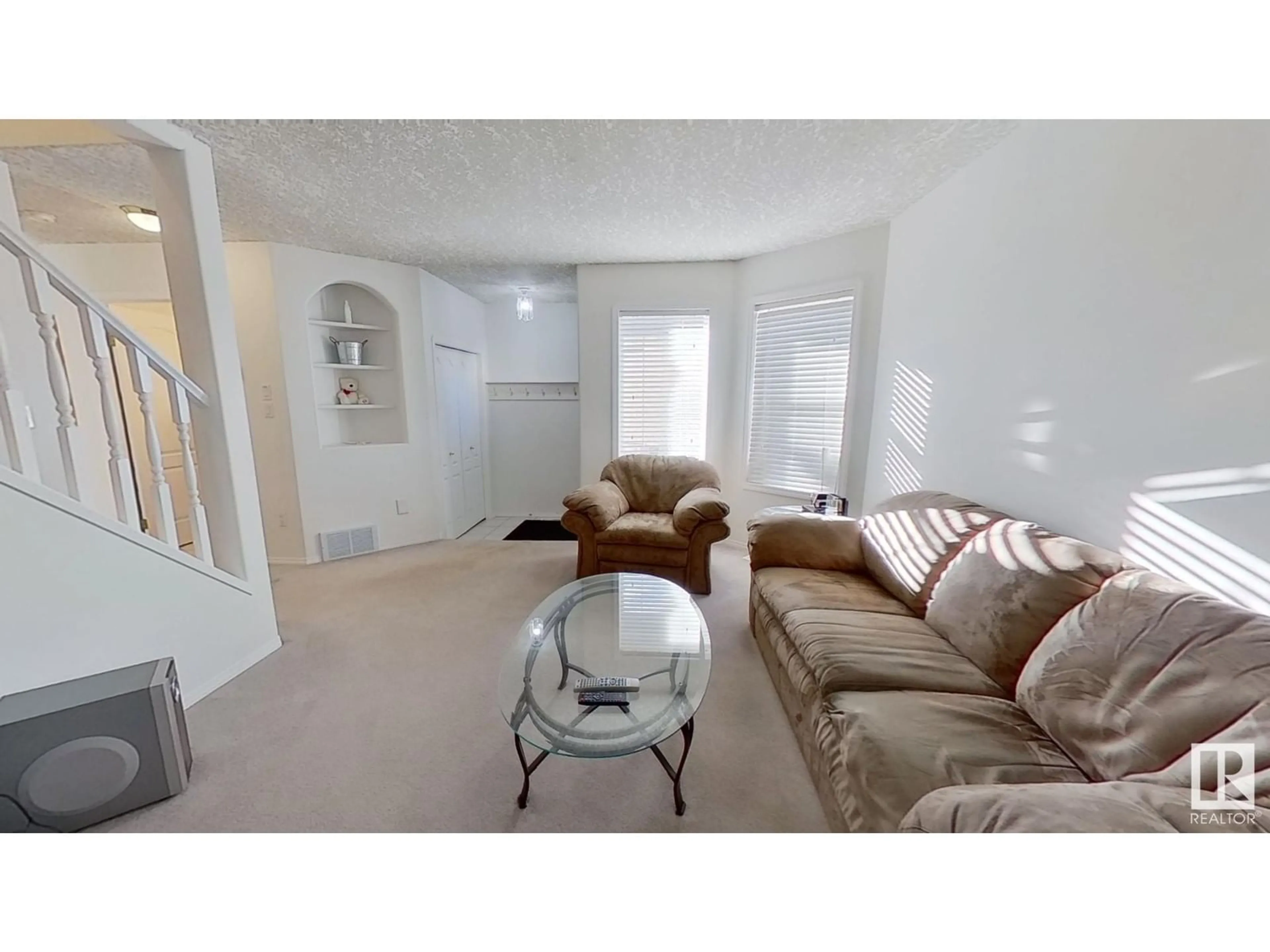 Living room, carpet floors for 4605 126 AV NW, Edmonton Alberta T5A4L1