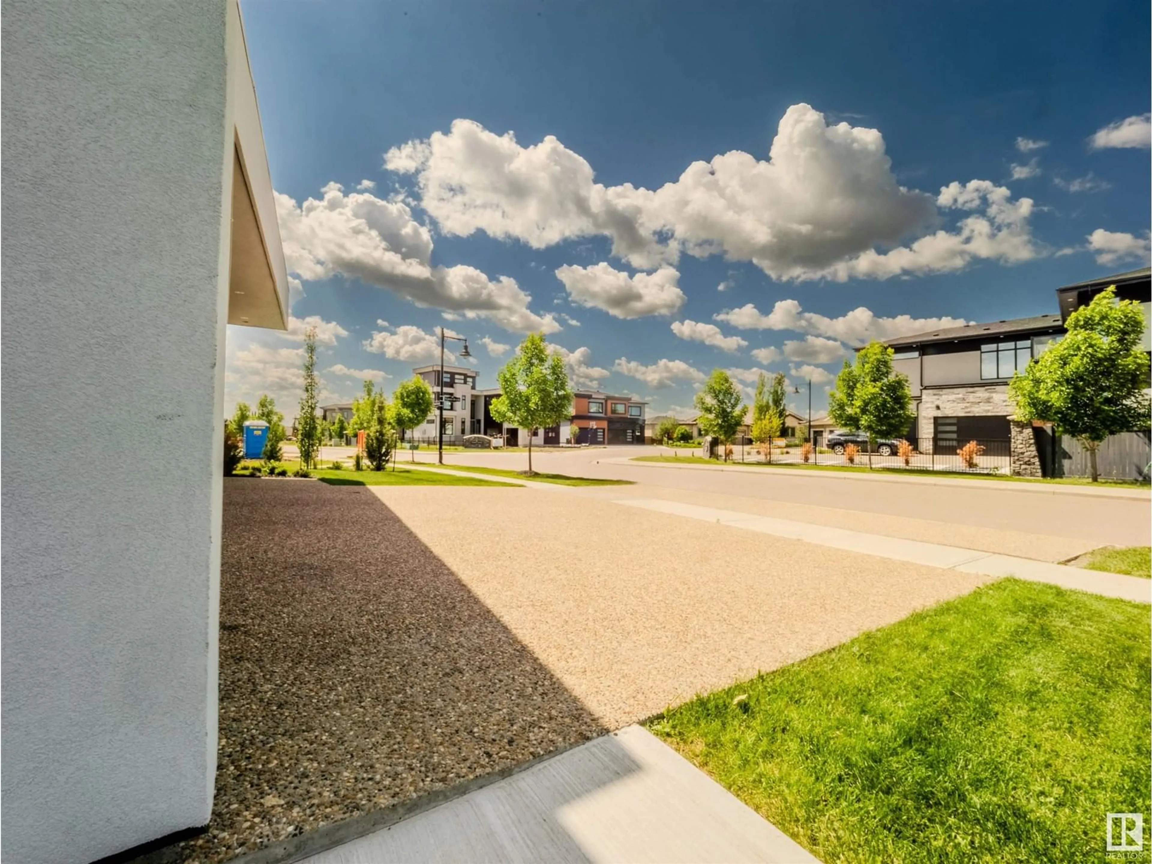 Patio, the street view for 4097 WHISPERING RIVER DR NW, Edmonton Alberta T6W2E2