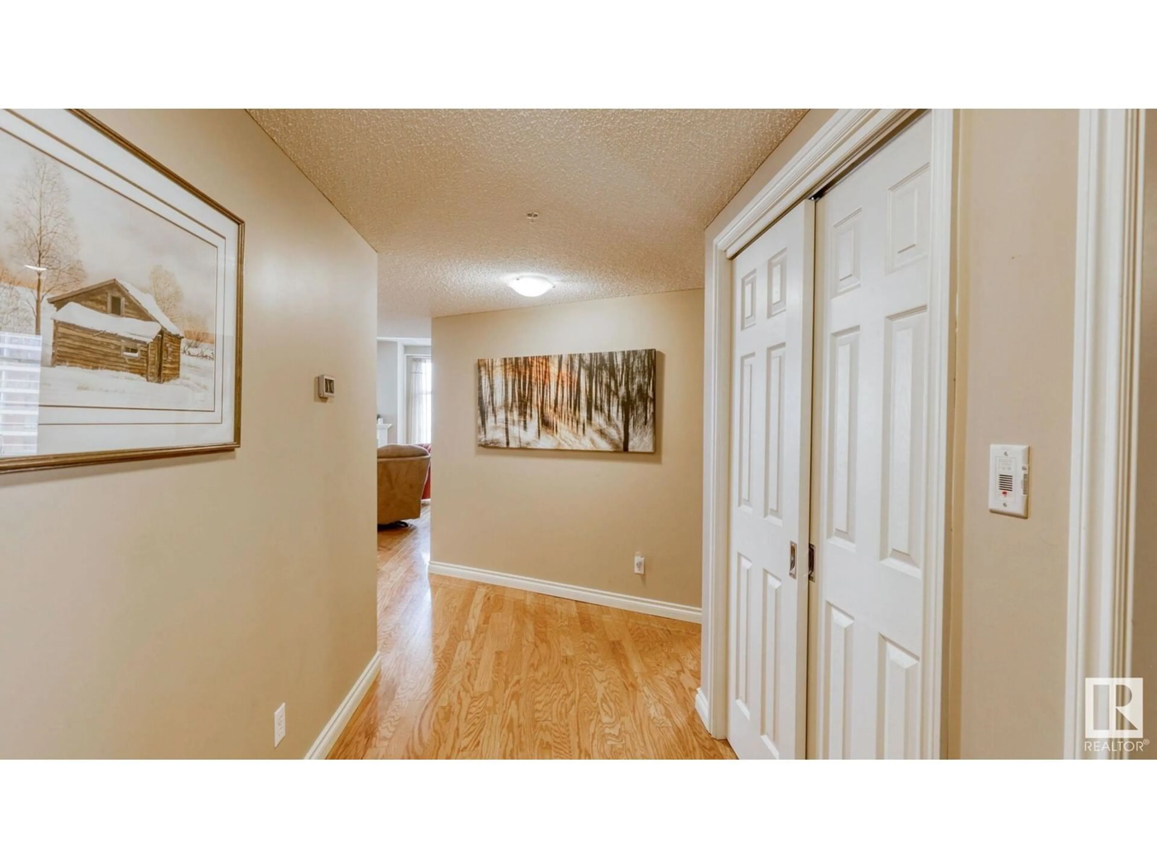 Indoor entryway, wood floors for #1401 9020 JASPER AV NW, Edmonton Alberta T5H3S8