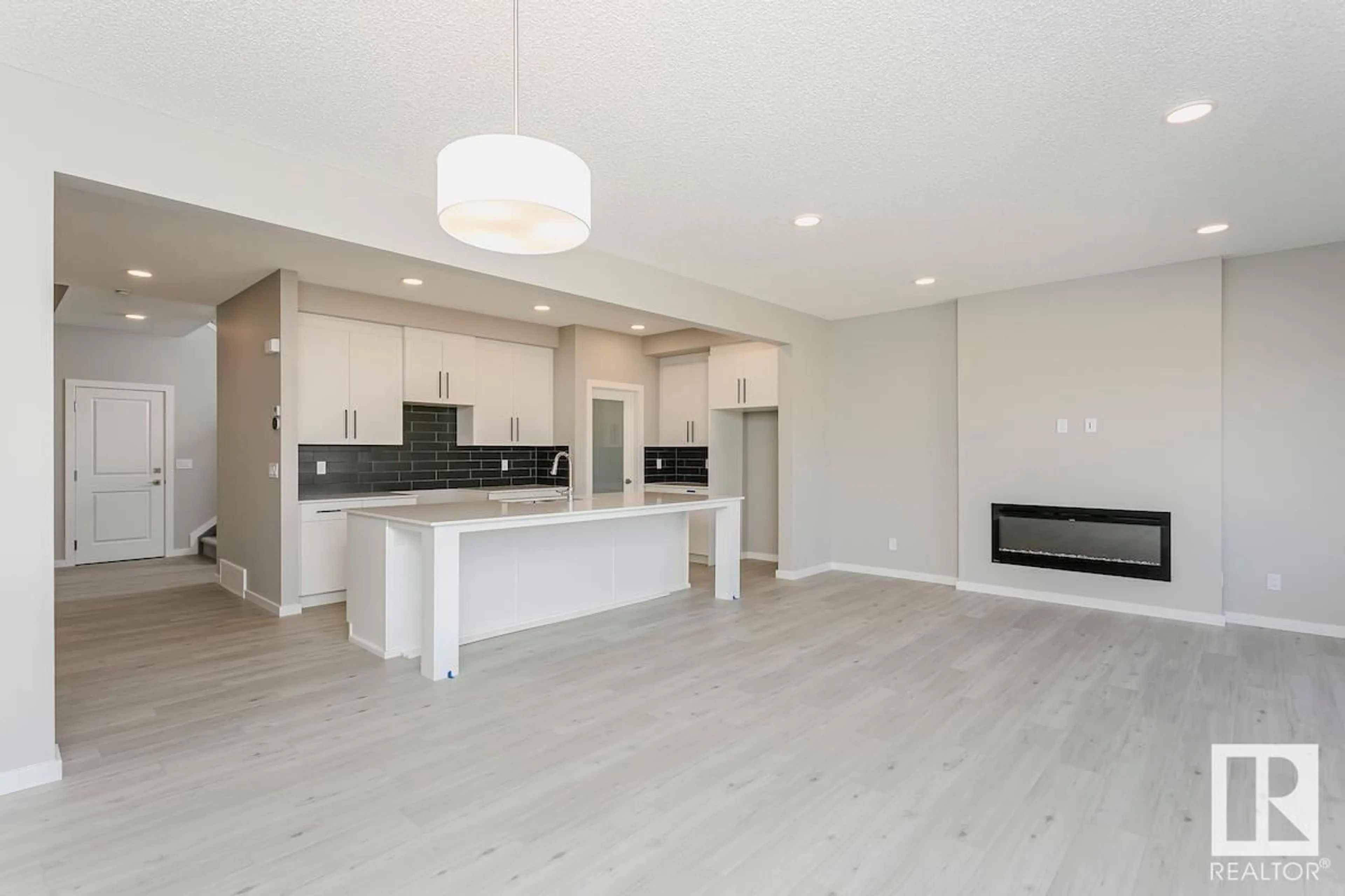 Open concept kitchen for 651 KINGLET BV NW, Edmonton Alberta T5S2B9