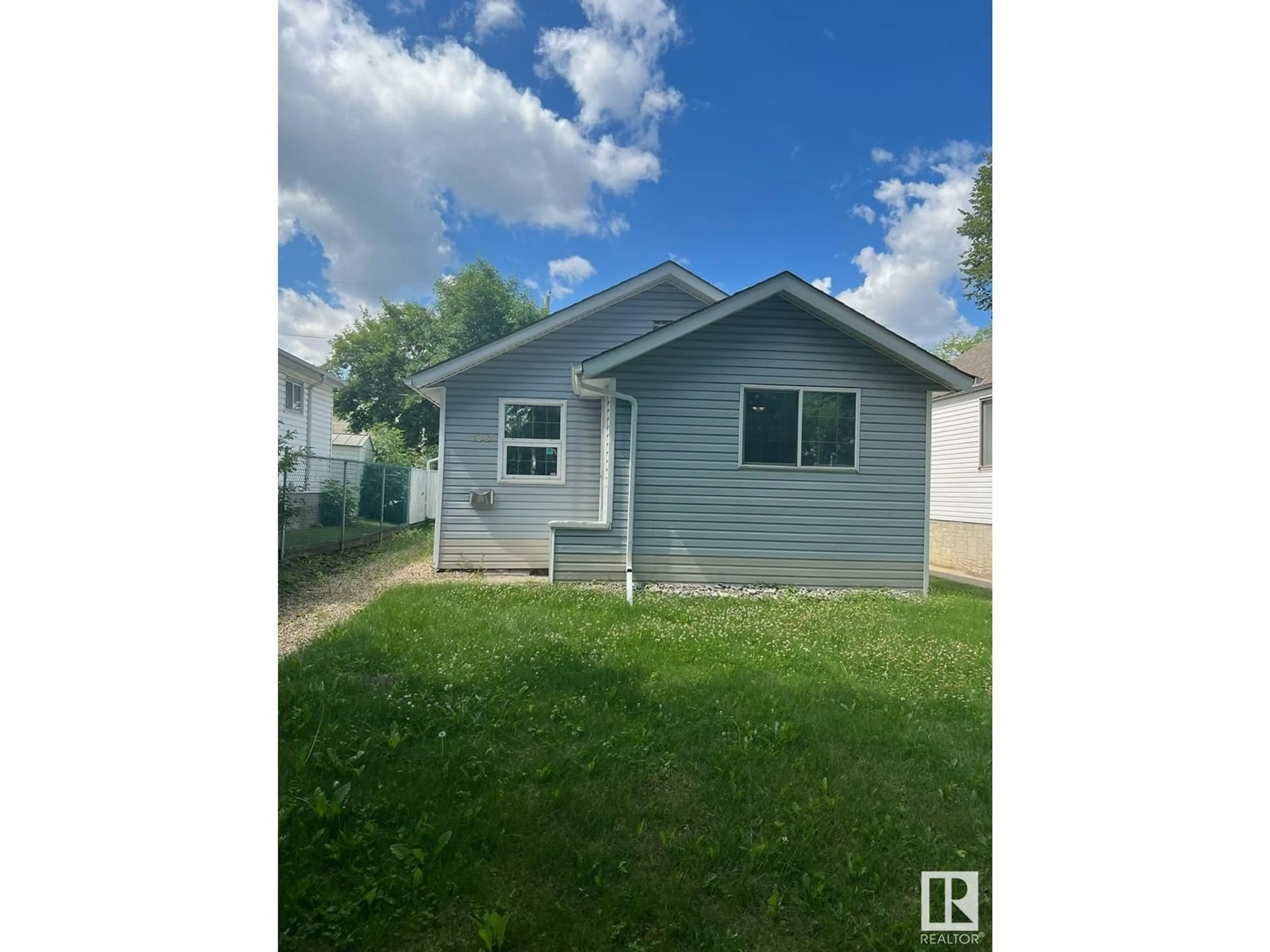 Frontside or backside of a home, cottage for 11842 65 ST NW NW, Edmonton Alberta T5W4L2