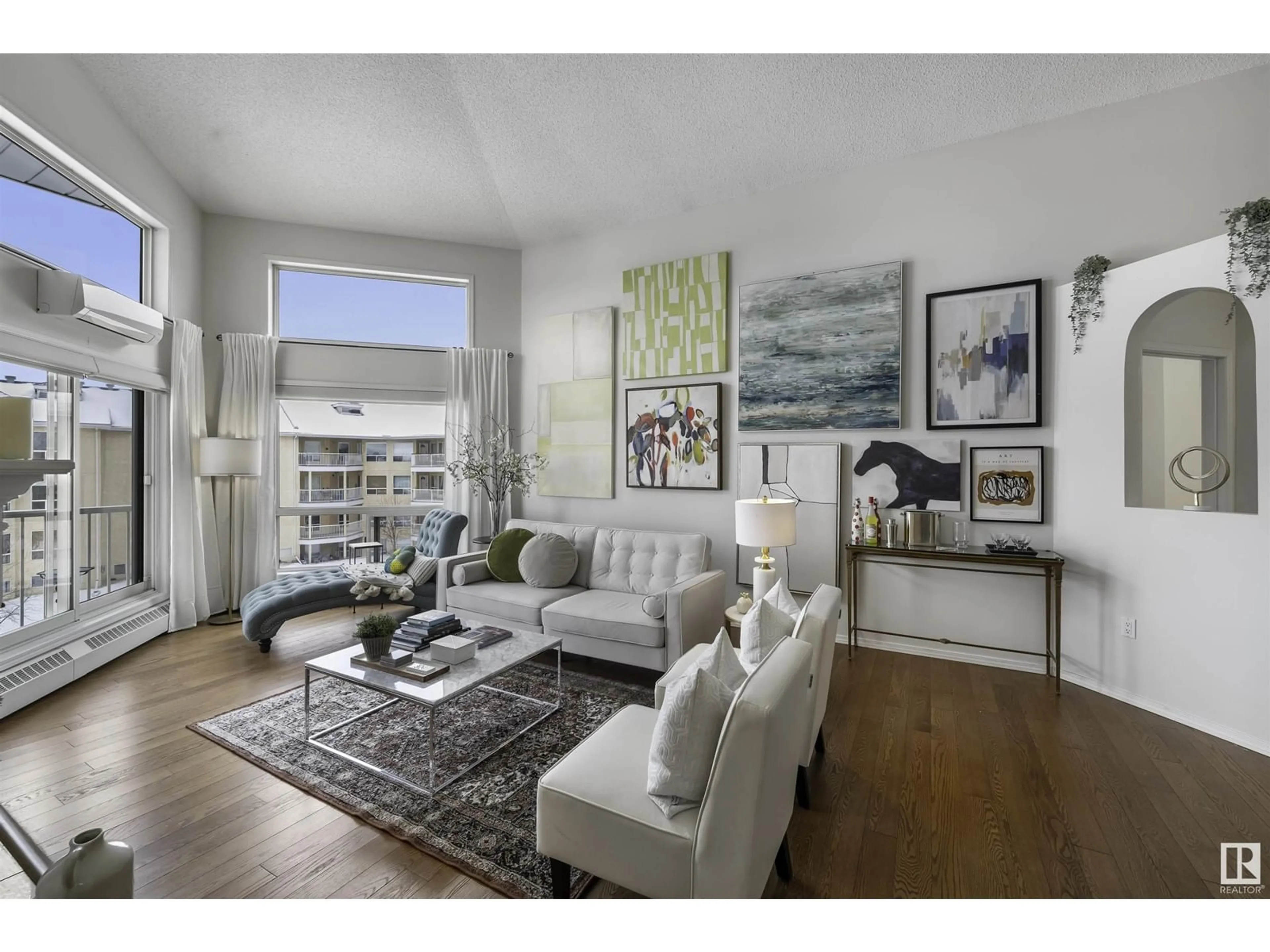 Living room, wood floors for #412 15499 CASTLE DOWNS RD NW, Edmonton Alberta T5X5Y3