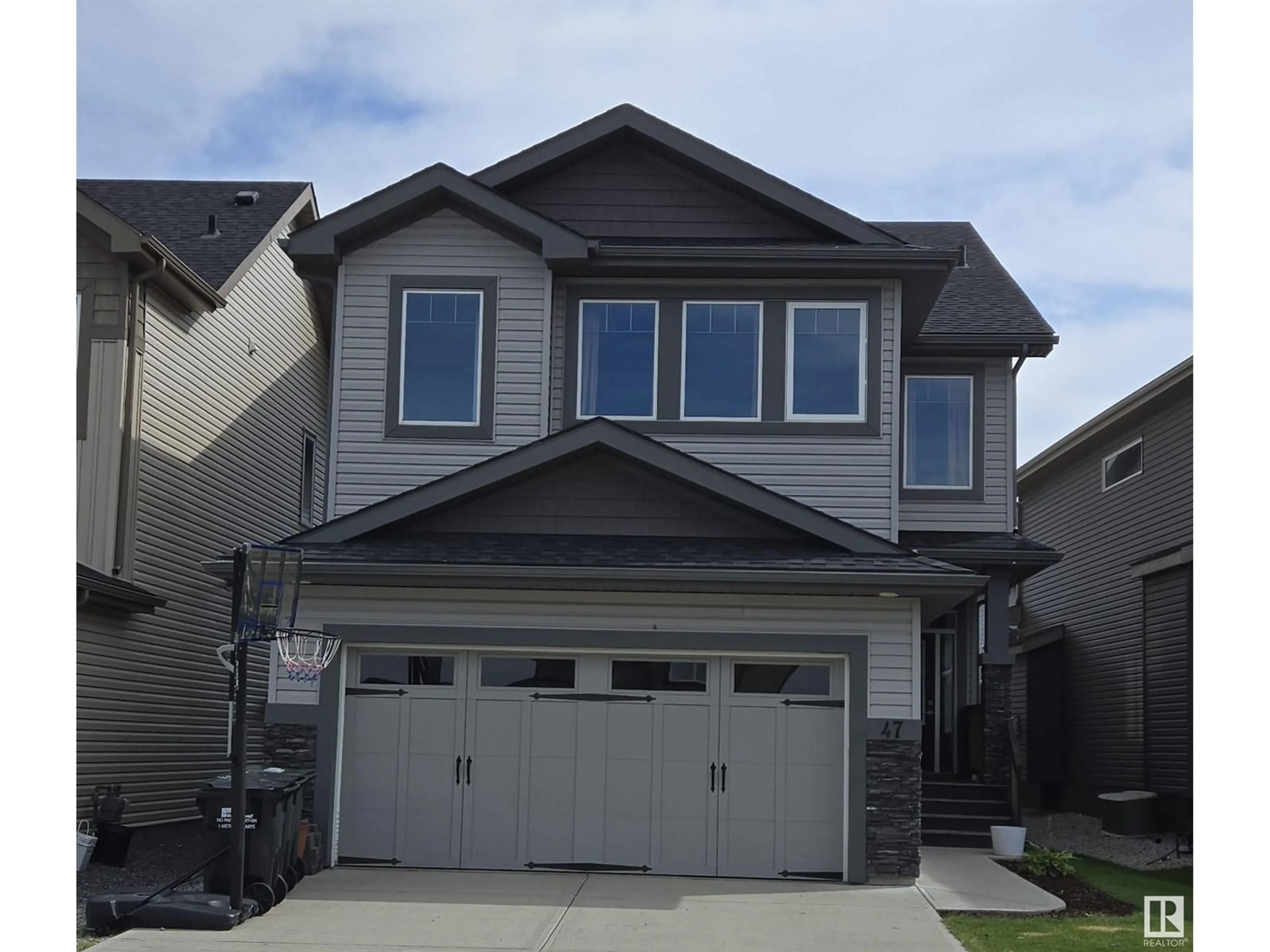 Frontside or backside of a home, the street view for 47 Ainsley WY, Sherwood Park Alberta T8H1A1