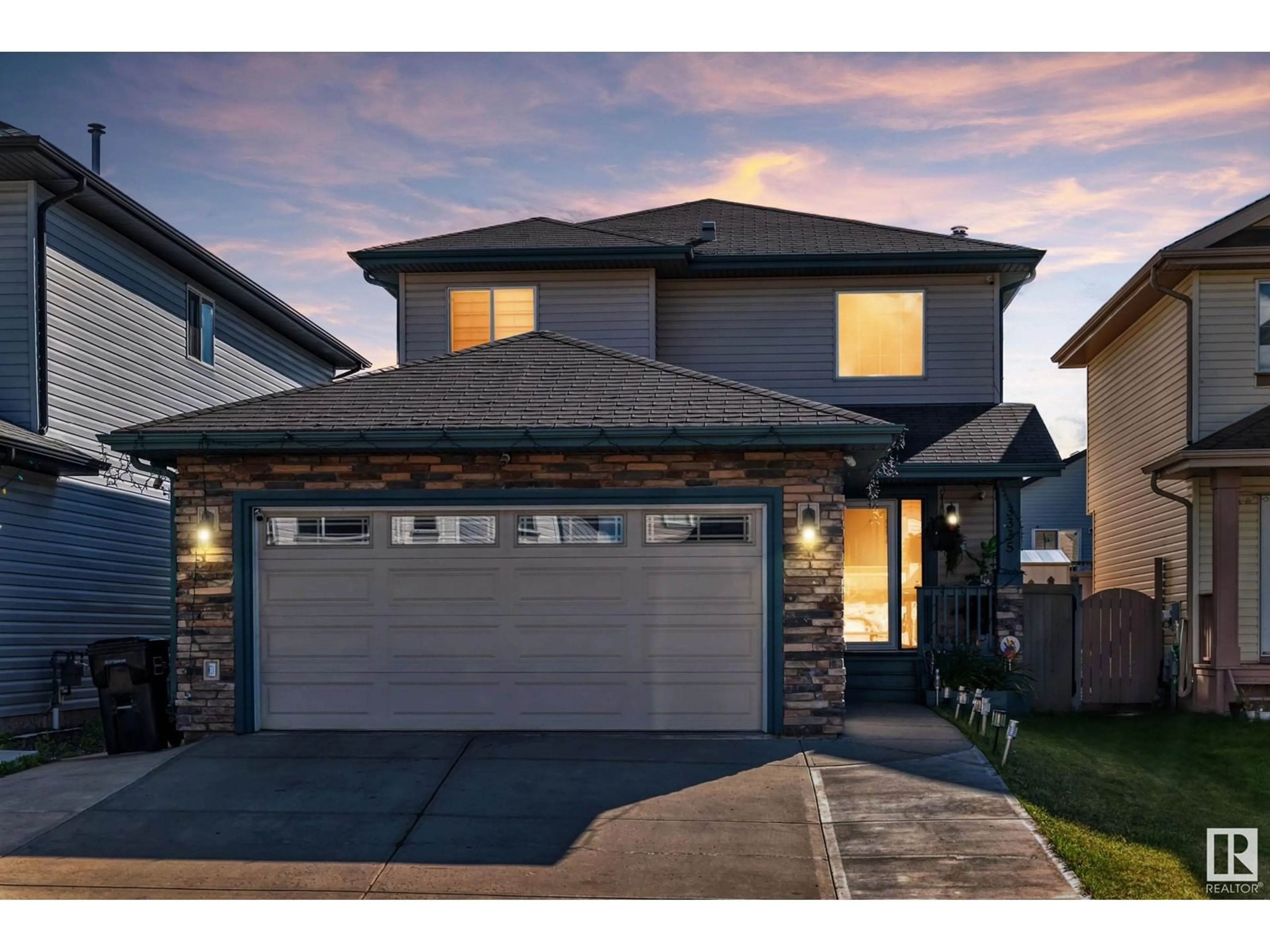 Frontside or backside of a home for 3335 25 Ave NW NW, Edmonton Alberta T6T1Y3