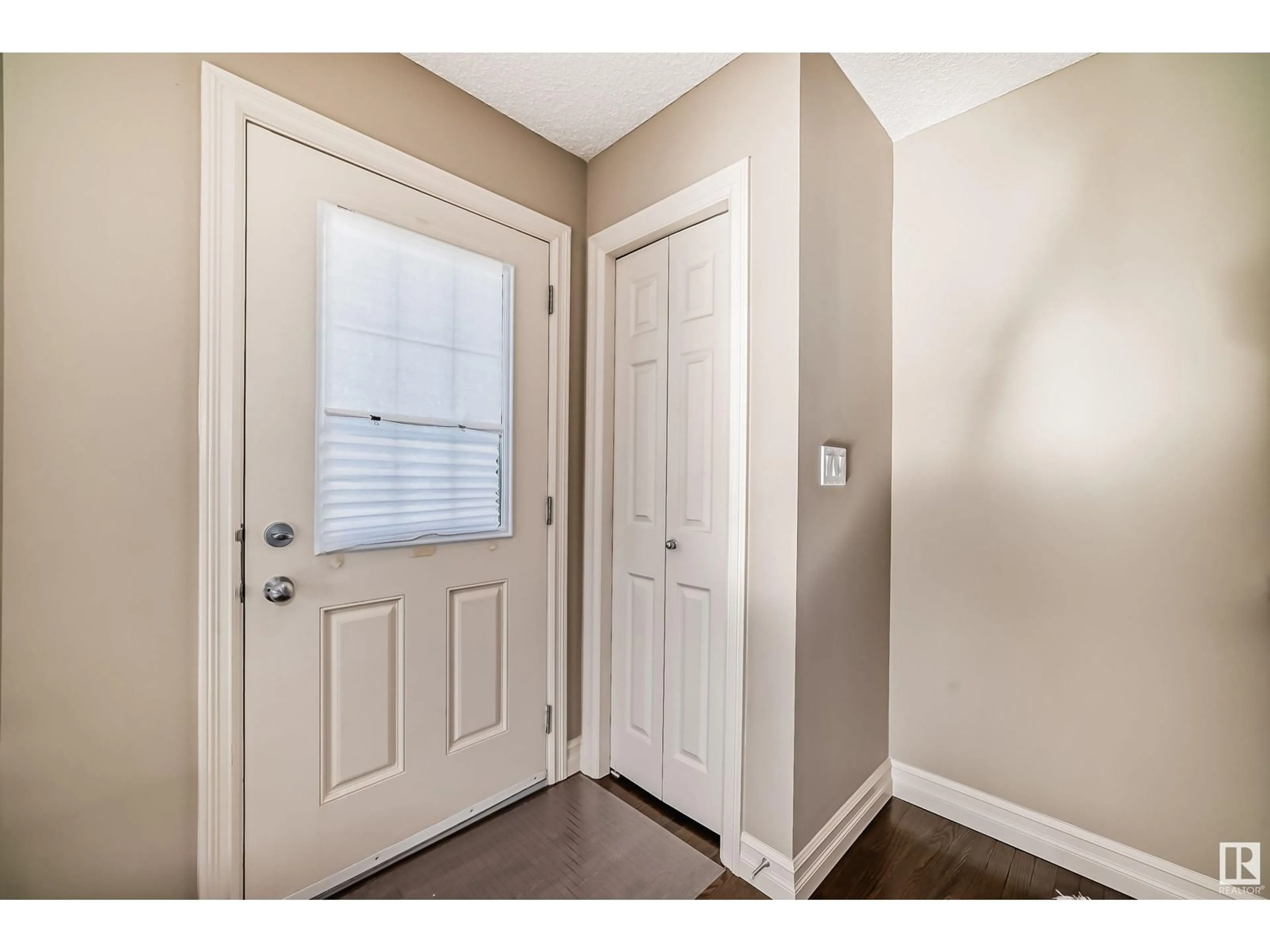 Indoor entryway, wood floors for #56 5317 3 AV SW SW, Edmonton Alberta T6X0W7