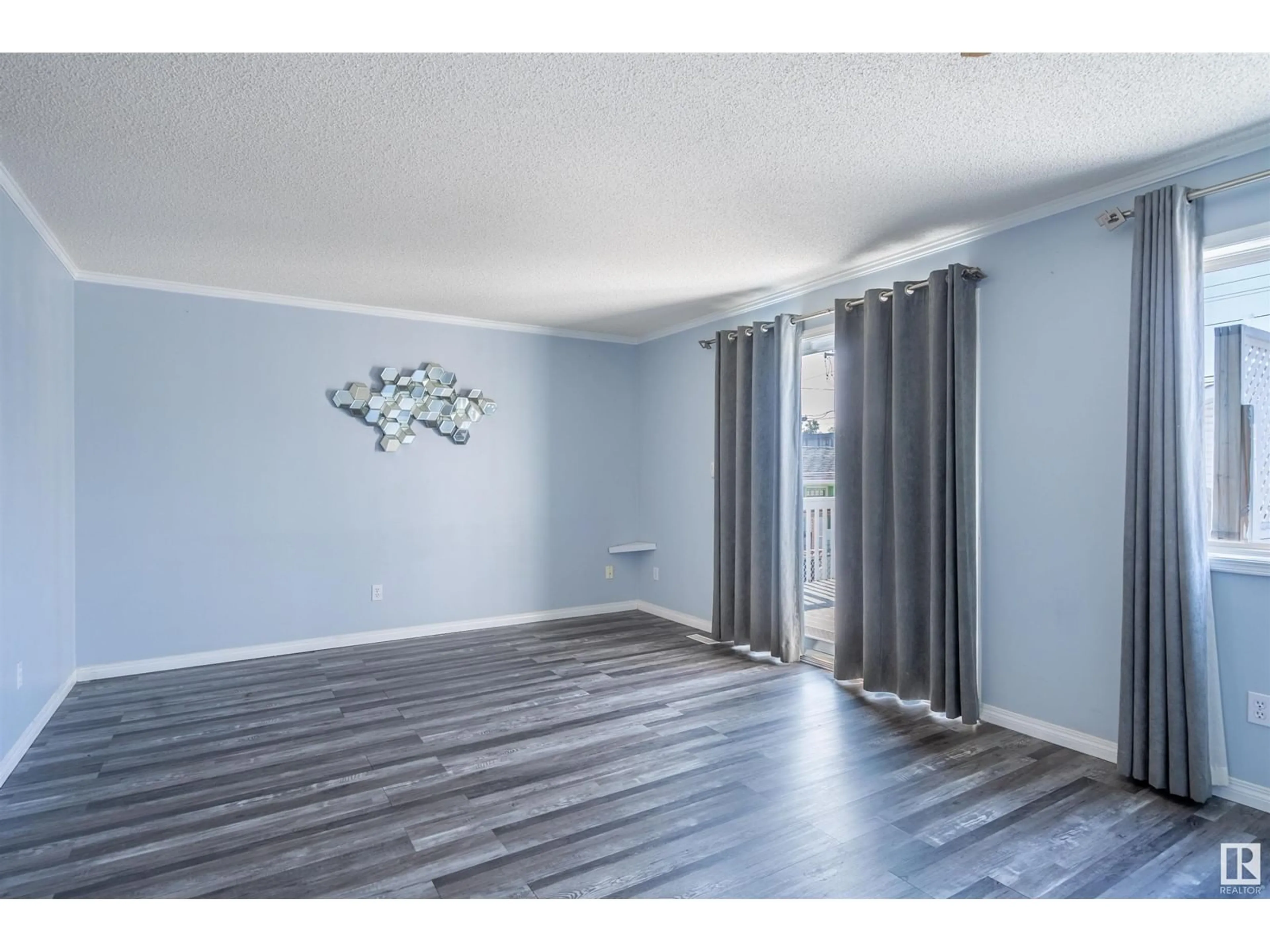 A pic of a room, wood floors for 10316 142 ST NW, Edmonton Alberta T5S2P1