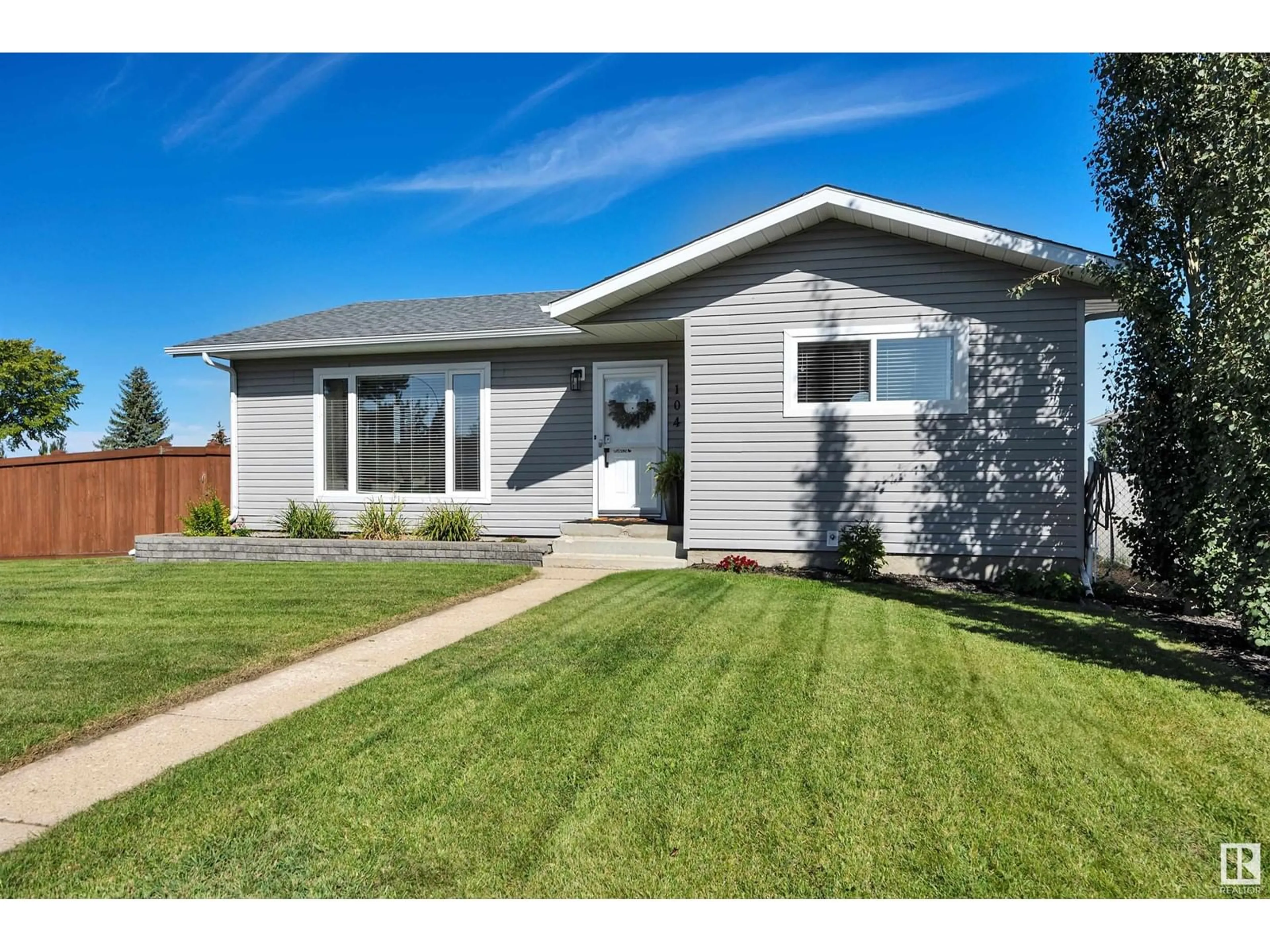 Frontside or backside of a home for 104 PIPESTONE DR, Millet Alberta T0C1Z0