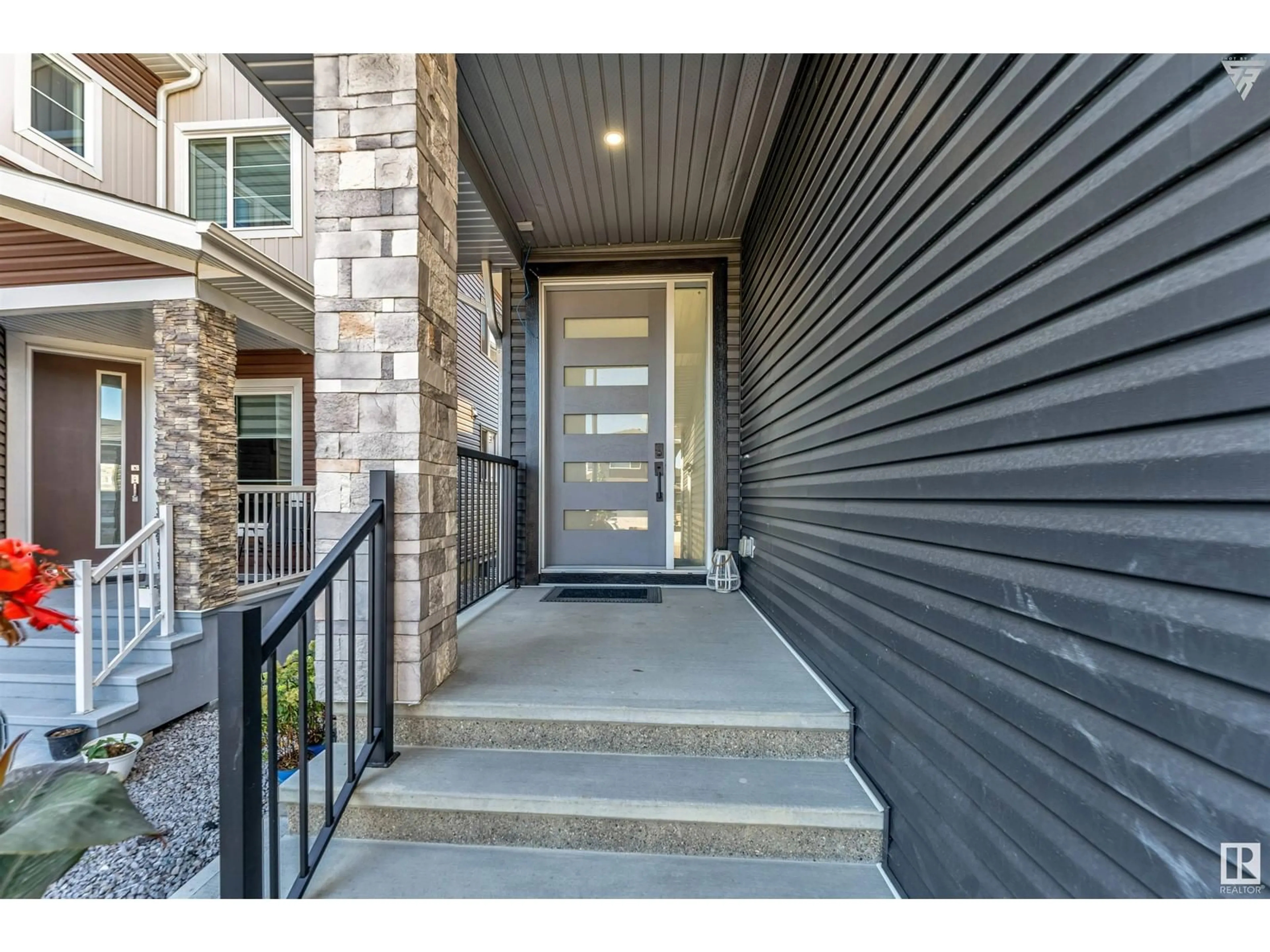 Indoor entryway, wood floors for 1836 22 ST NW, Edmonton Alberta T6T2M5