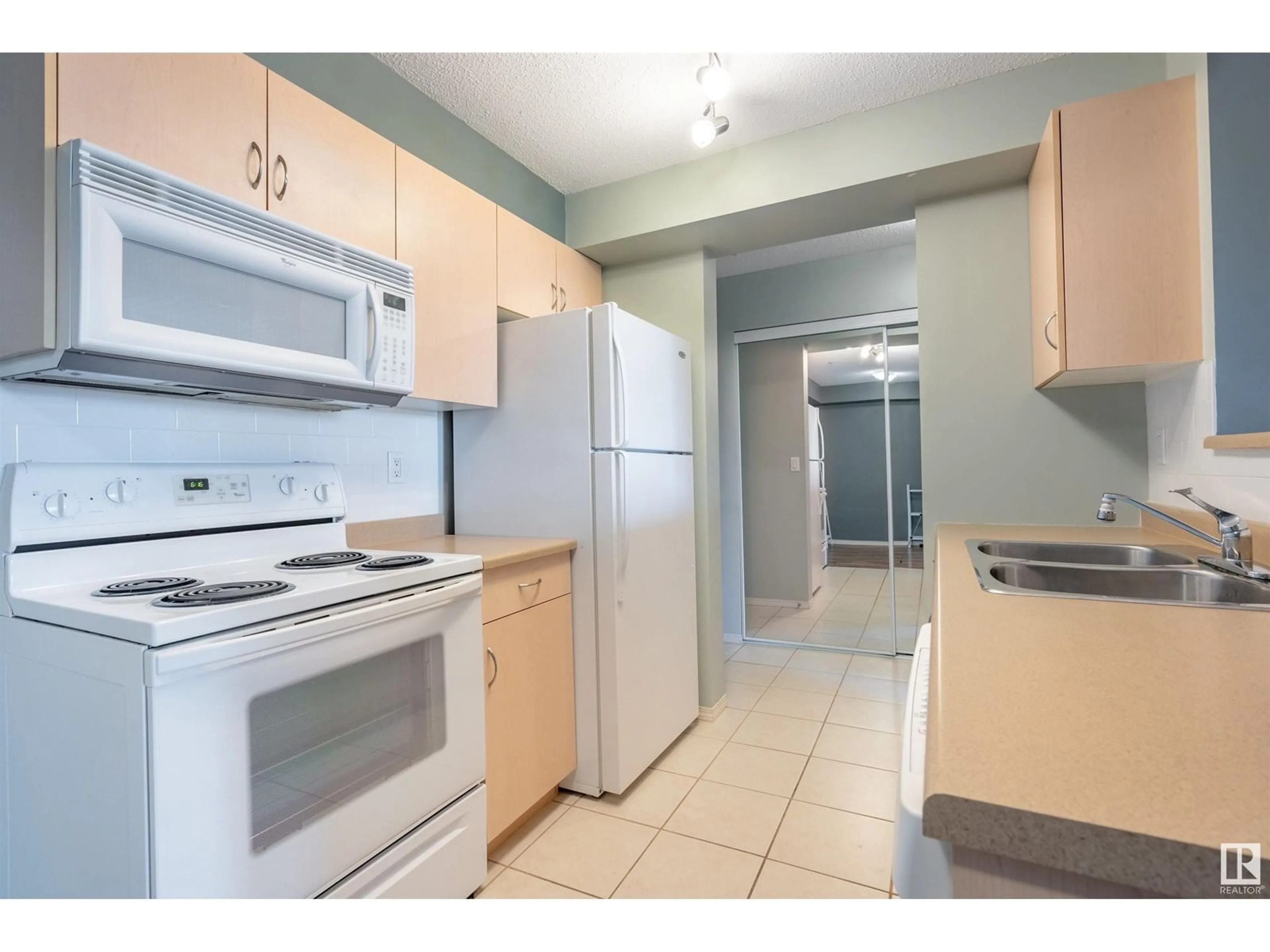 Standard kitchen for #101 17011 67 AV NW, Edmonton Alberta T5T6Y5