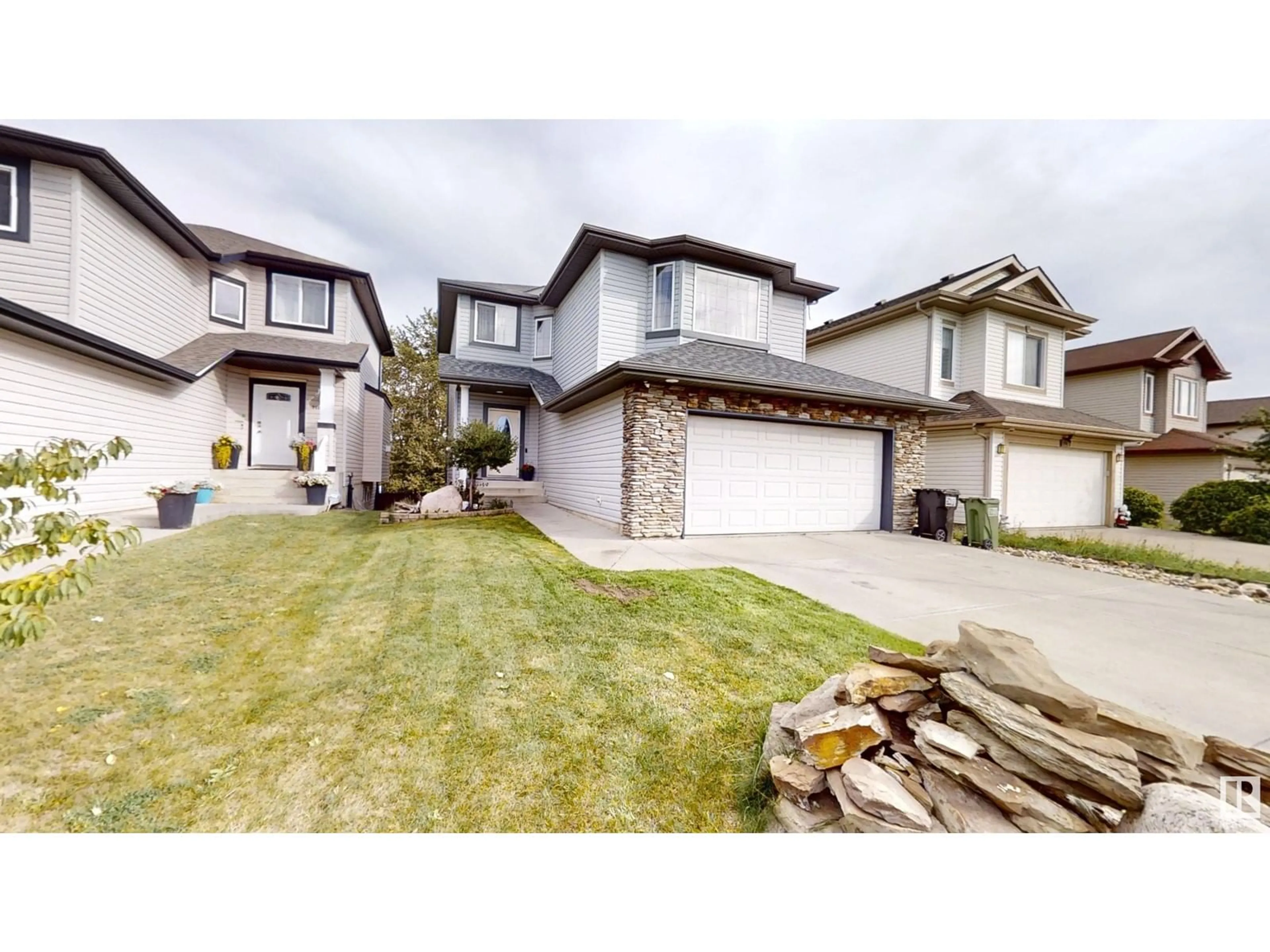 Frontside or backside of a home, the street view for 9111 205 ST NW, Edmonton Alberta T5T0X1