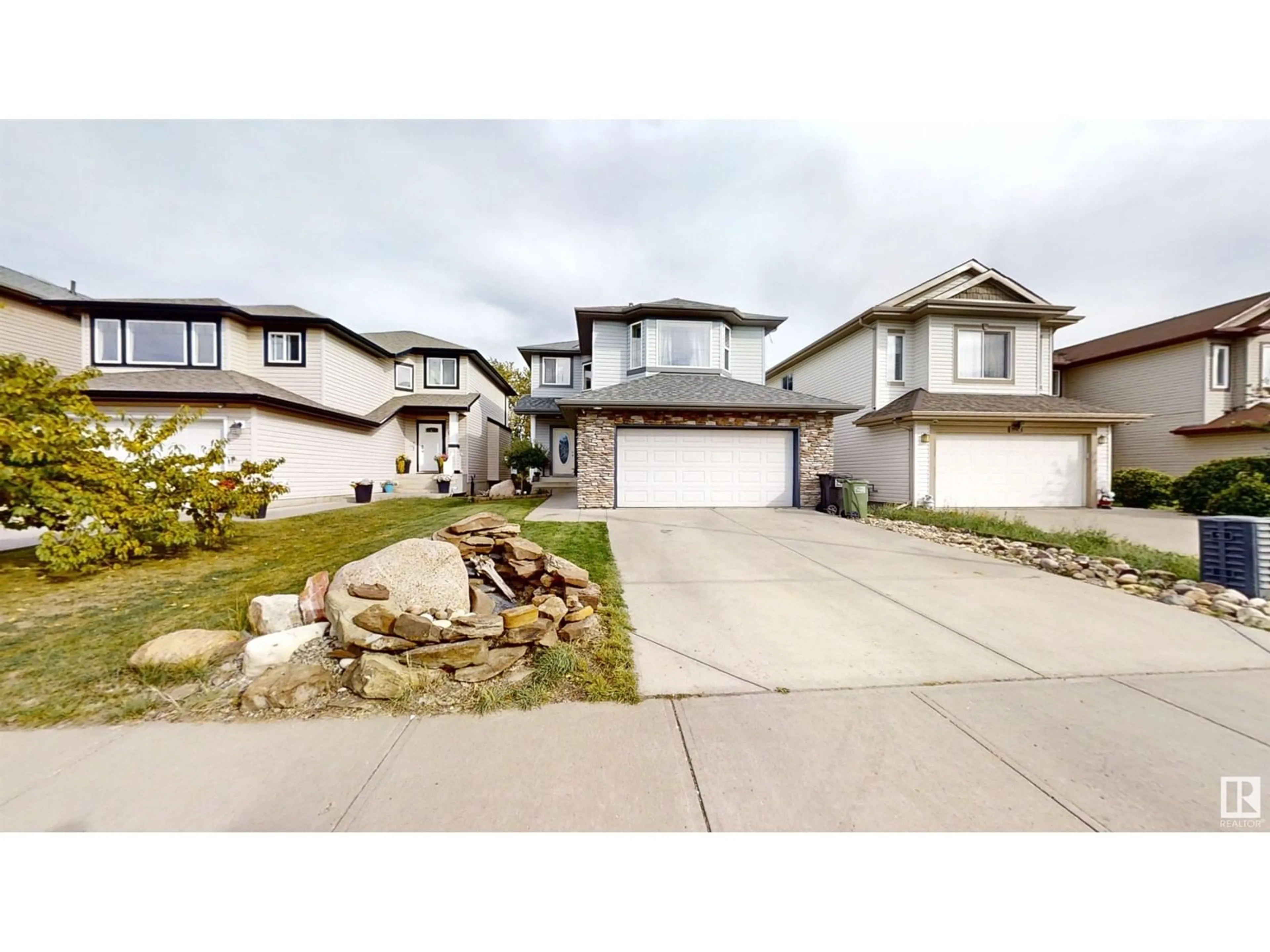 Frontside or backside of a home, the street view for 9111 205 ST NW, Edmonton Alberta T5T0X1