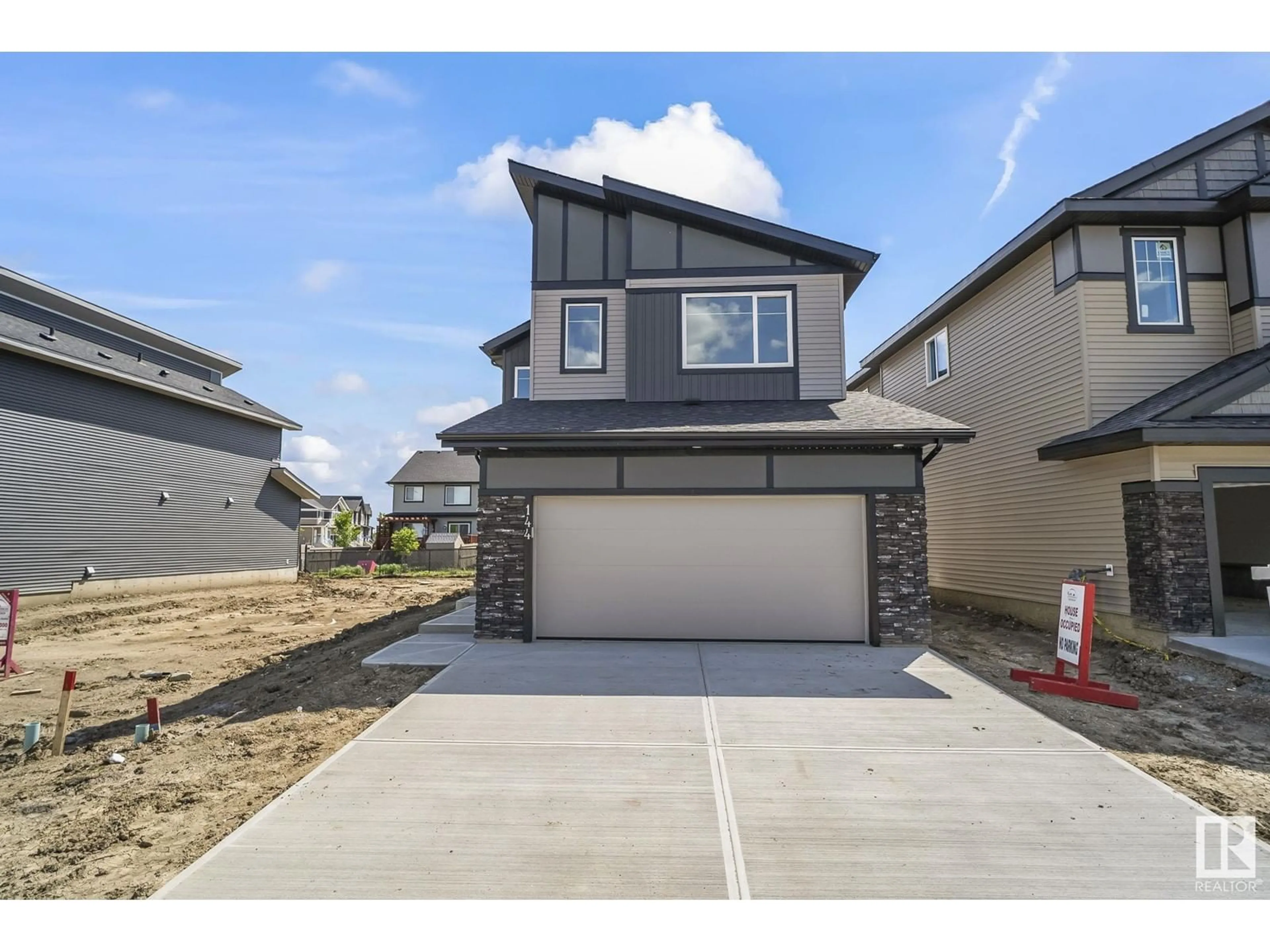 Frontside or backside of a home, the street view for 144 Larch Crescent, Leduc Alberta T9E1N3