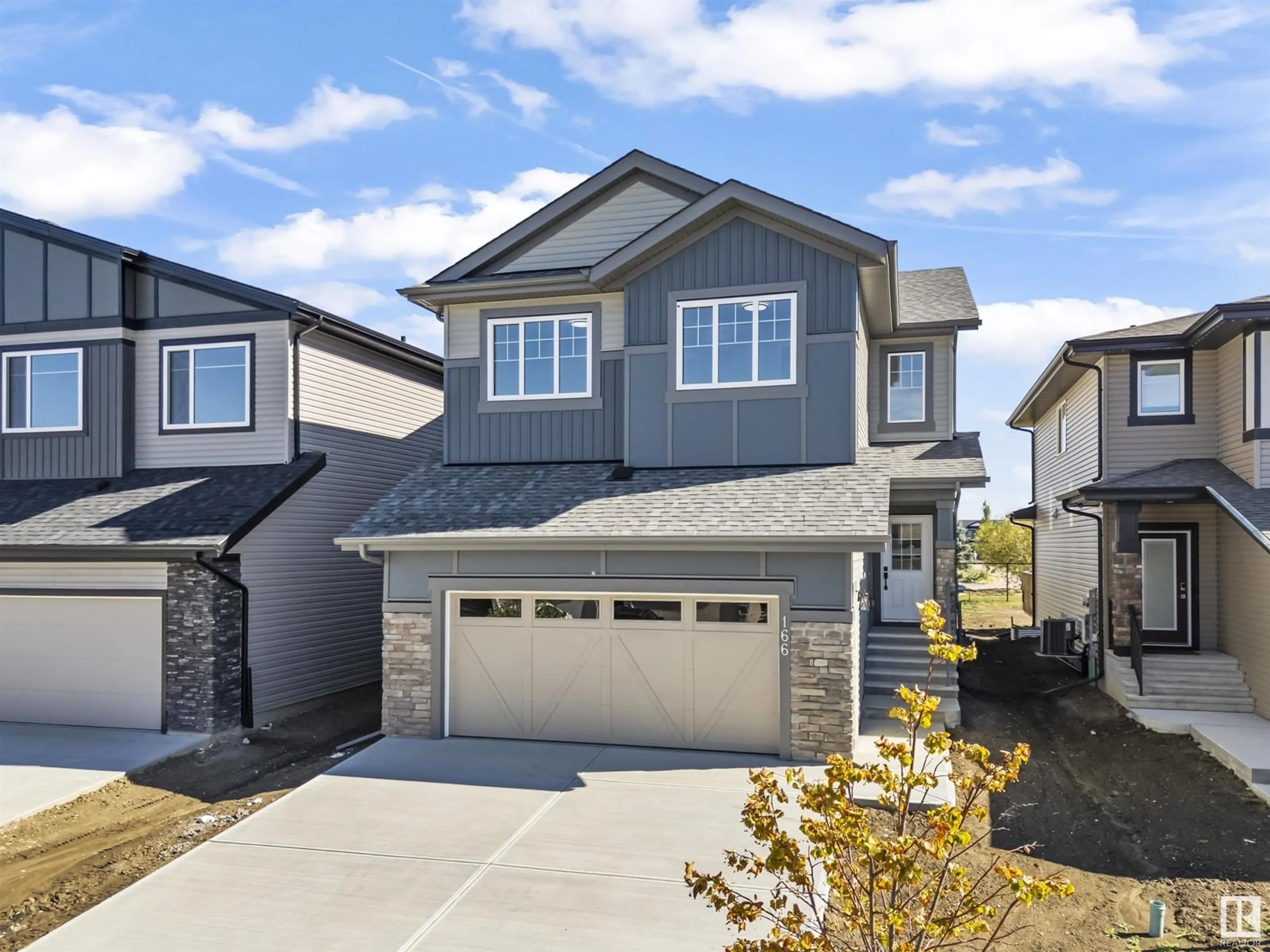 Frontside or backside of a home, the street view for 166 Larch Crescent, Leduc Alberta T9E1N3