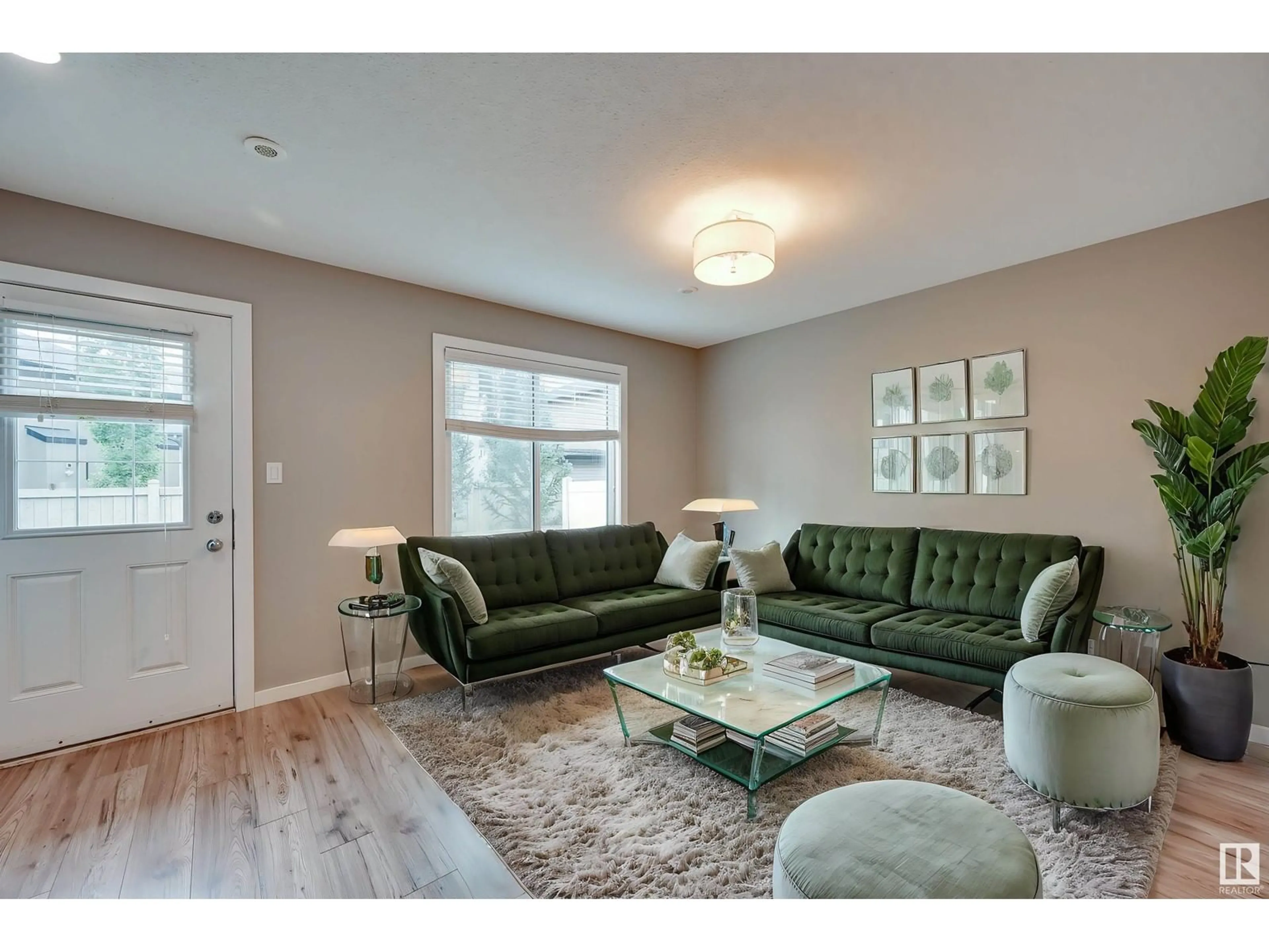 Living room, wood floors for #29 2215 24 ST NW, Edmonton Alberta T6T1A6