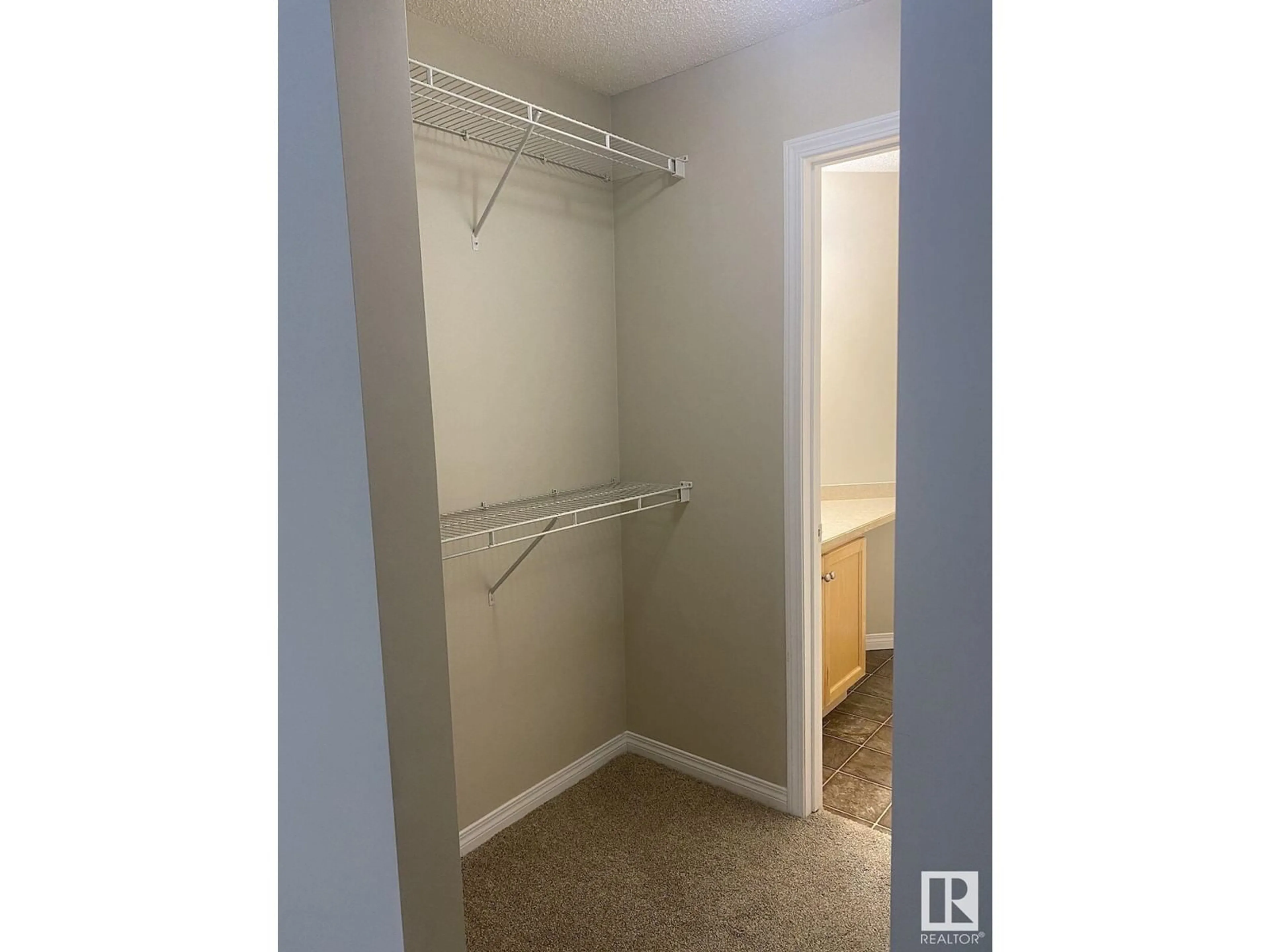 Storage room or clothes room or walk-in closet for #122 9525 162 AV NW, Edmonton Alberta T5Z3V2