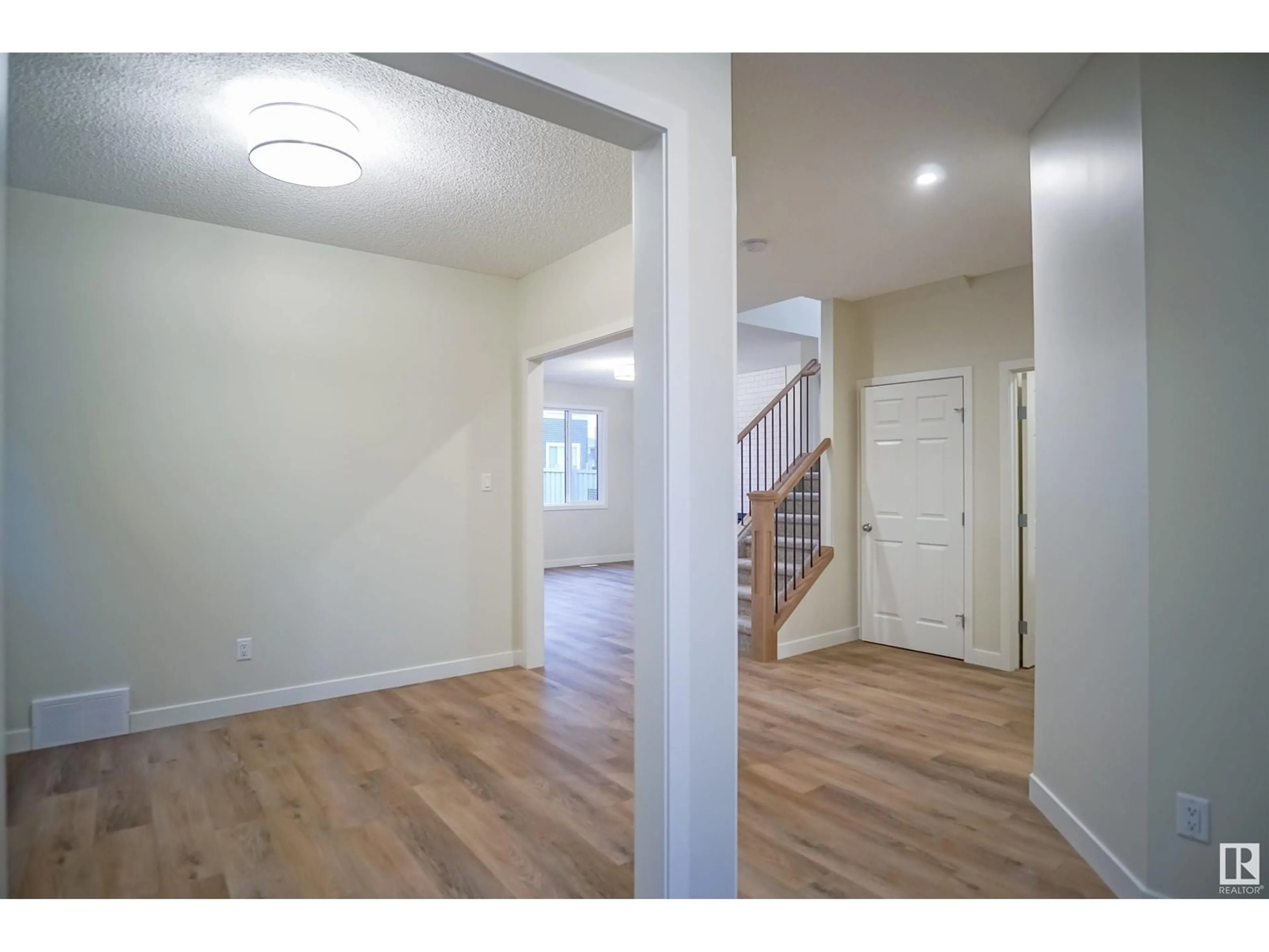 Indoor entryway, wood floors for 1233 16A AV NW, Edmonton Alberta T6T2V1