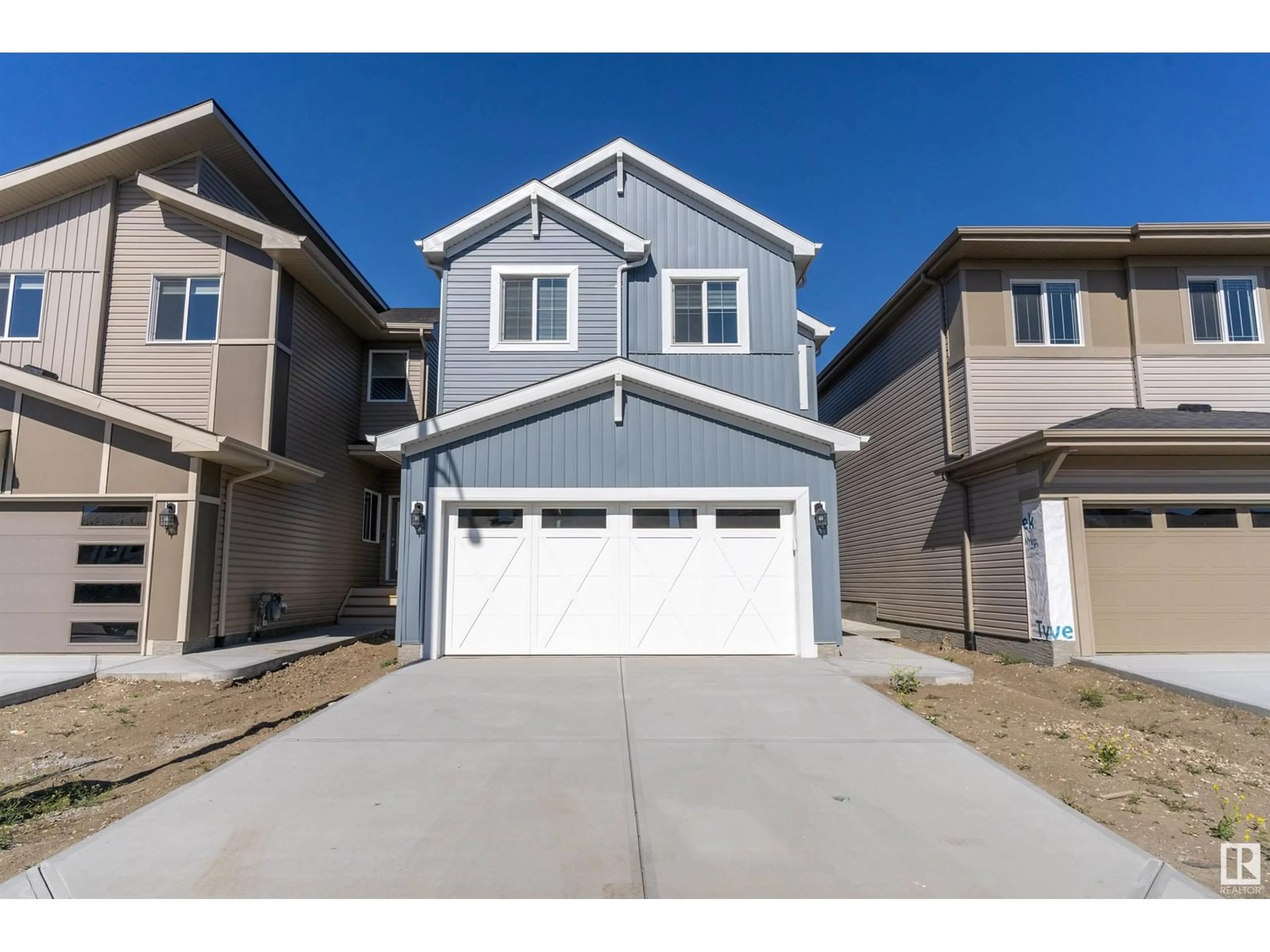 Frontside or backside of a home, the street view for 15656 18 AV SW, Edmonton Alberta T6W5C2