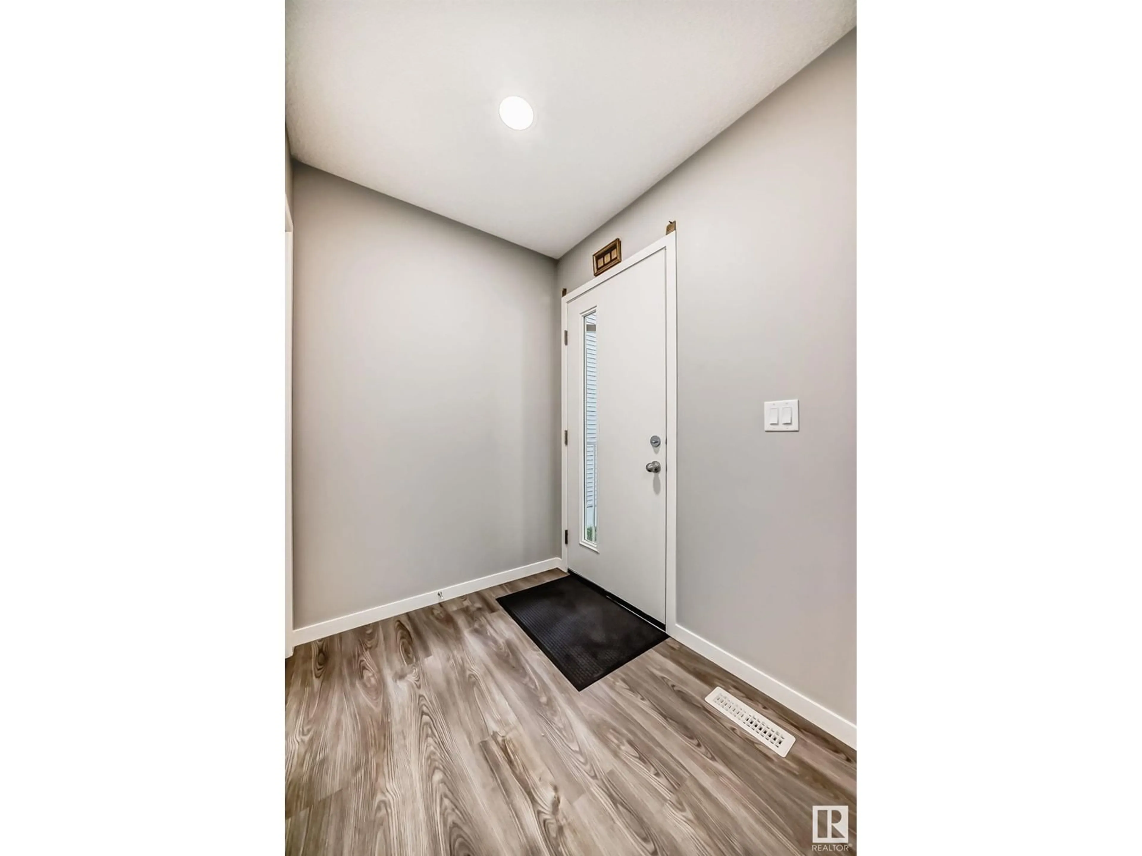 Indoor entryway, wood floors for 9806 227 ST NW, Edmonton Alberta T5T7T9