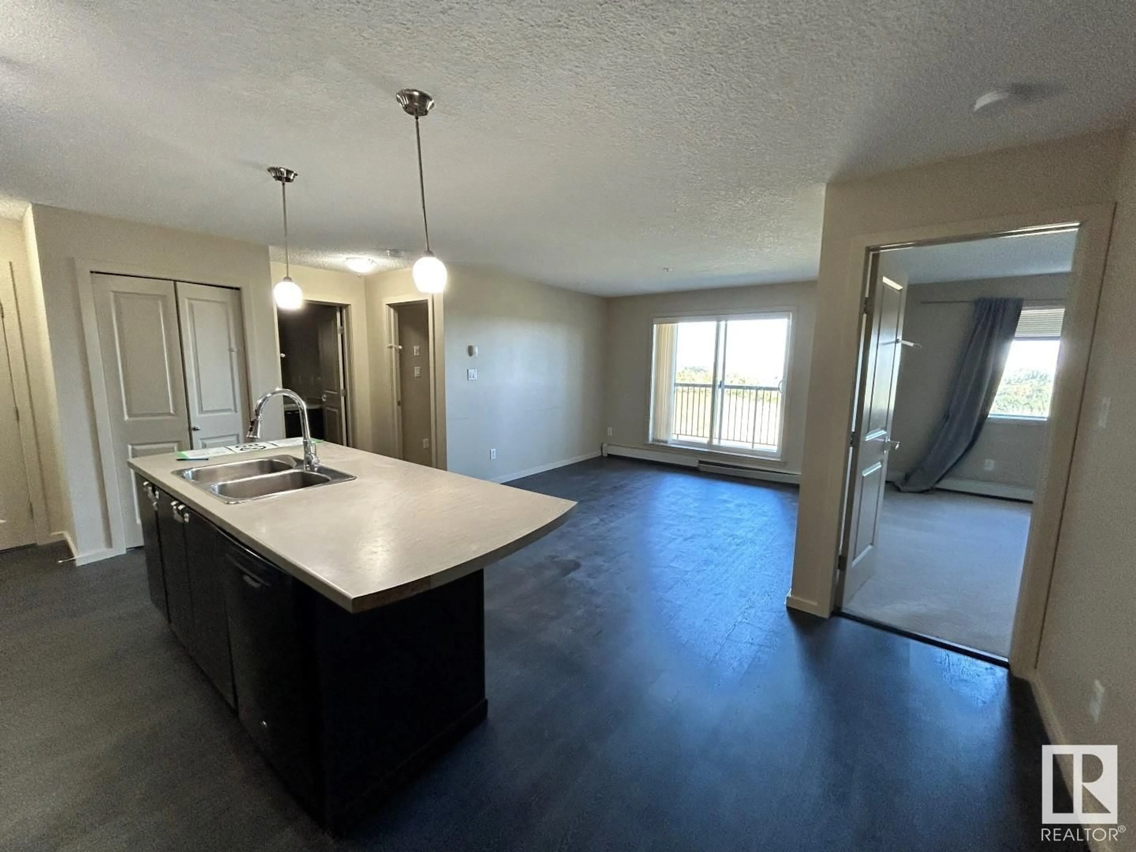 Open concept kitchen for #361 1196 HYNDMAN RD NW, Edmonton Alberta T5A0X8