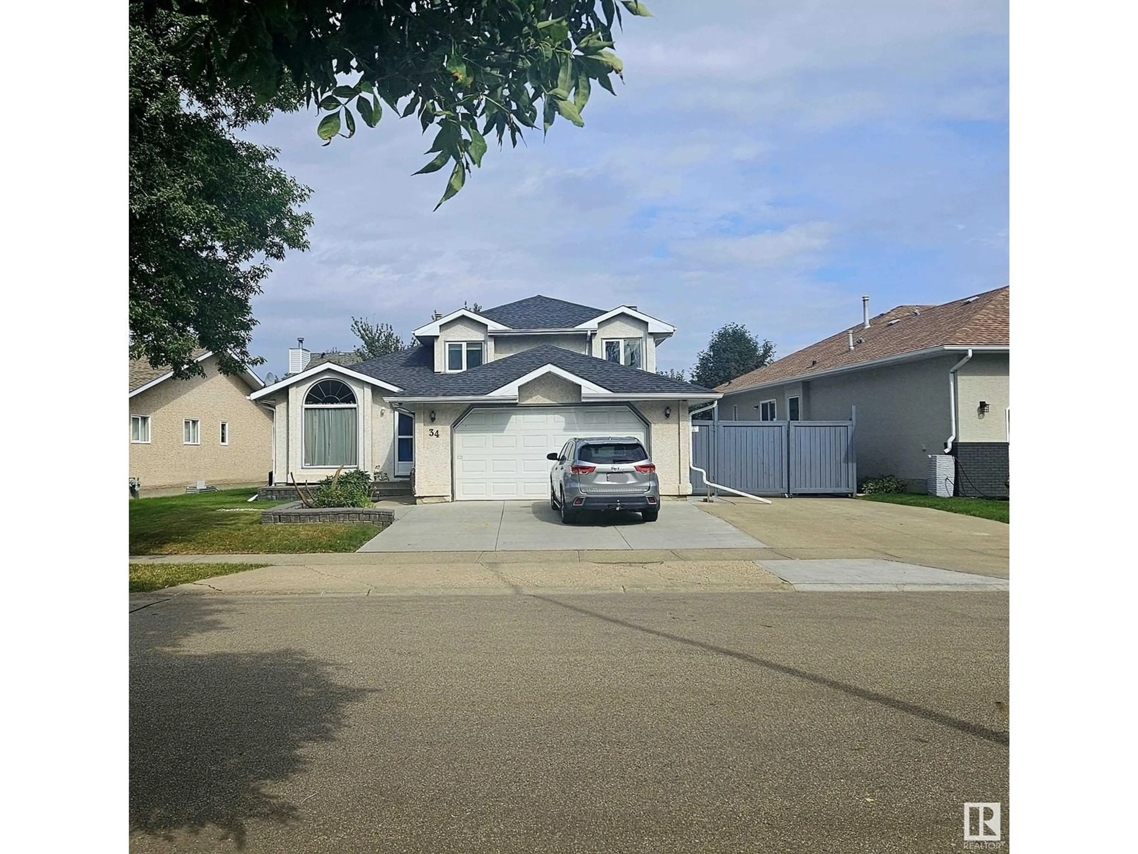 Frontside or backside of a home, the street view for 34 ARCAND DR, St. Albert Alberta T8N1V5