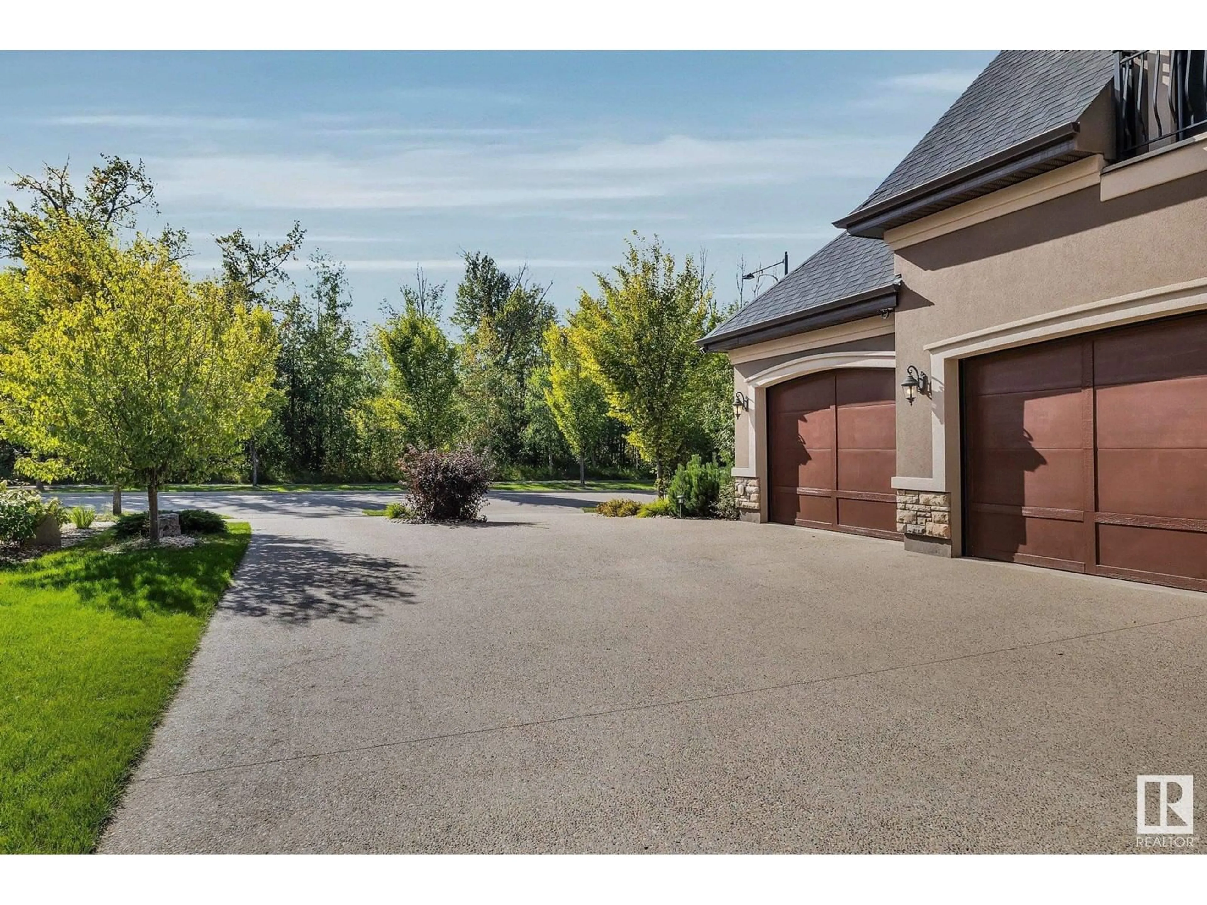 Patio, the fenced backyard for 4409 KENNEDY CV SW, Edmonton Alberta T6W3B3