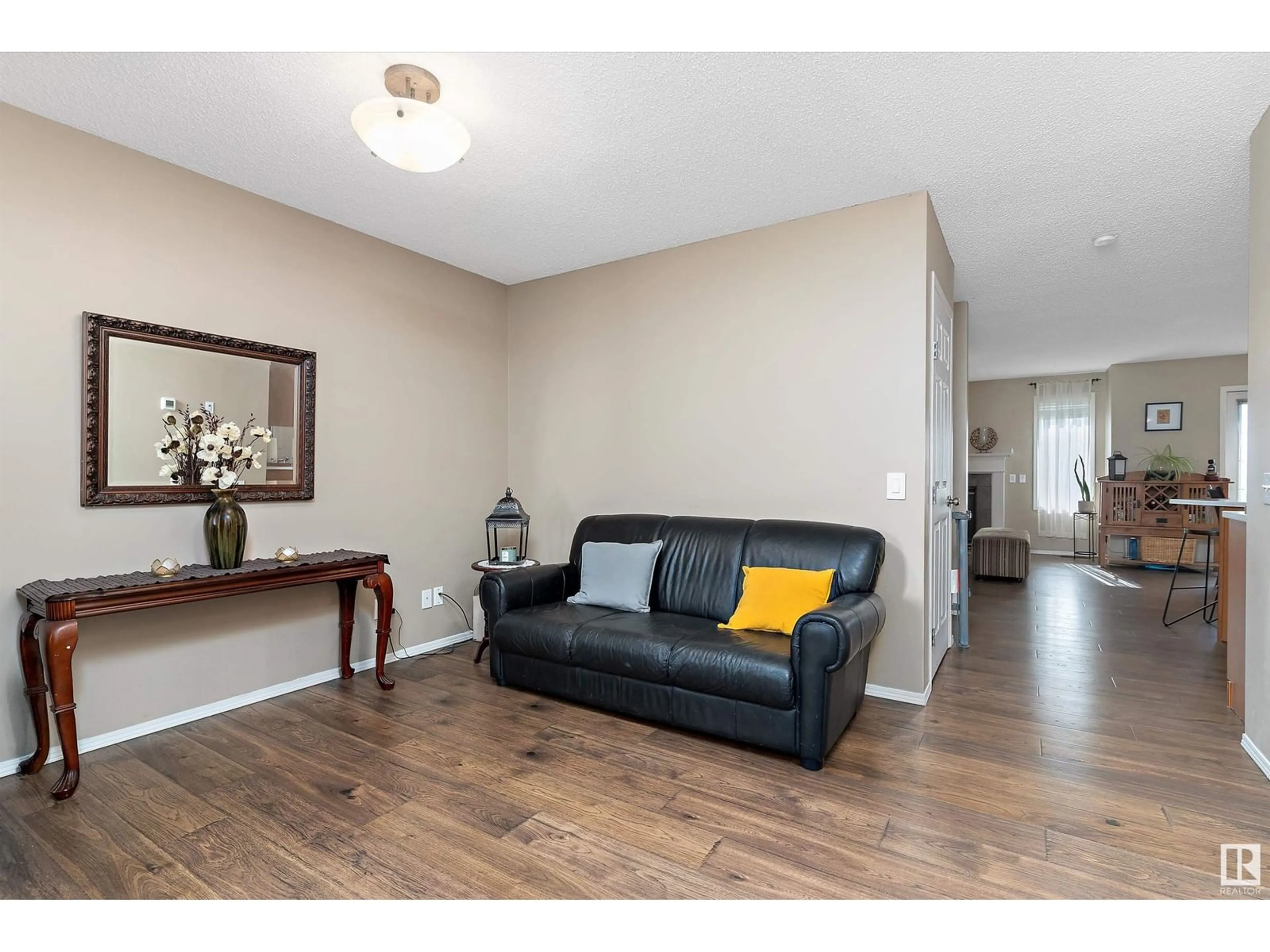 Living room, wood floors for 21027 92 AV NW, Edmonton Alberta T5T6X2