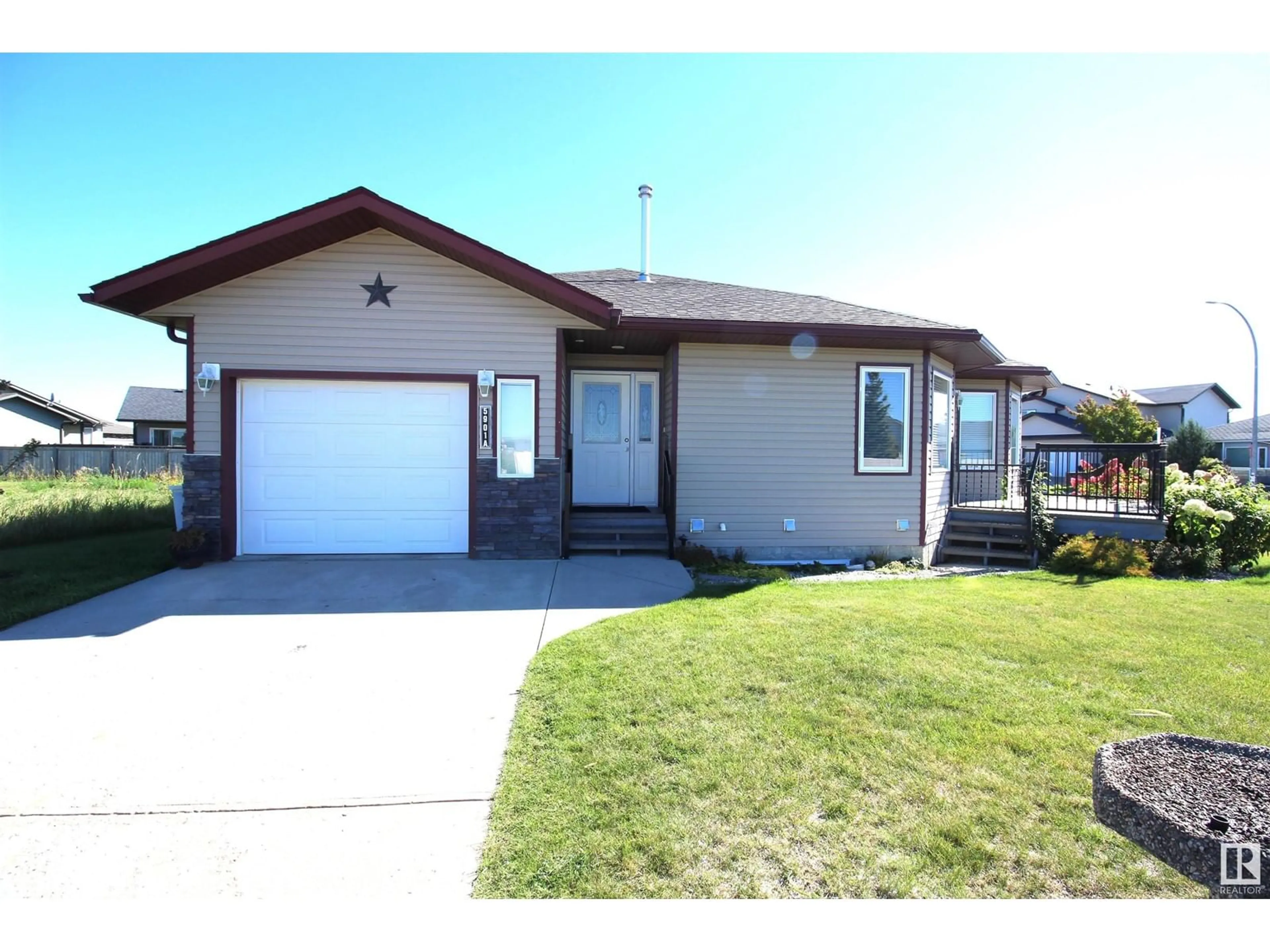 Frontside or backside of a home for 5901A 46 ST, Barrhead Alberta T7N0A4