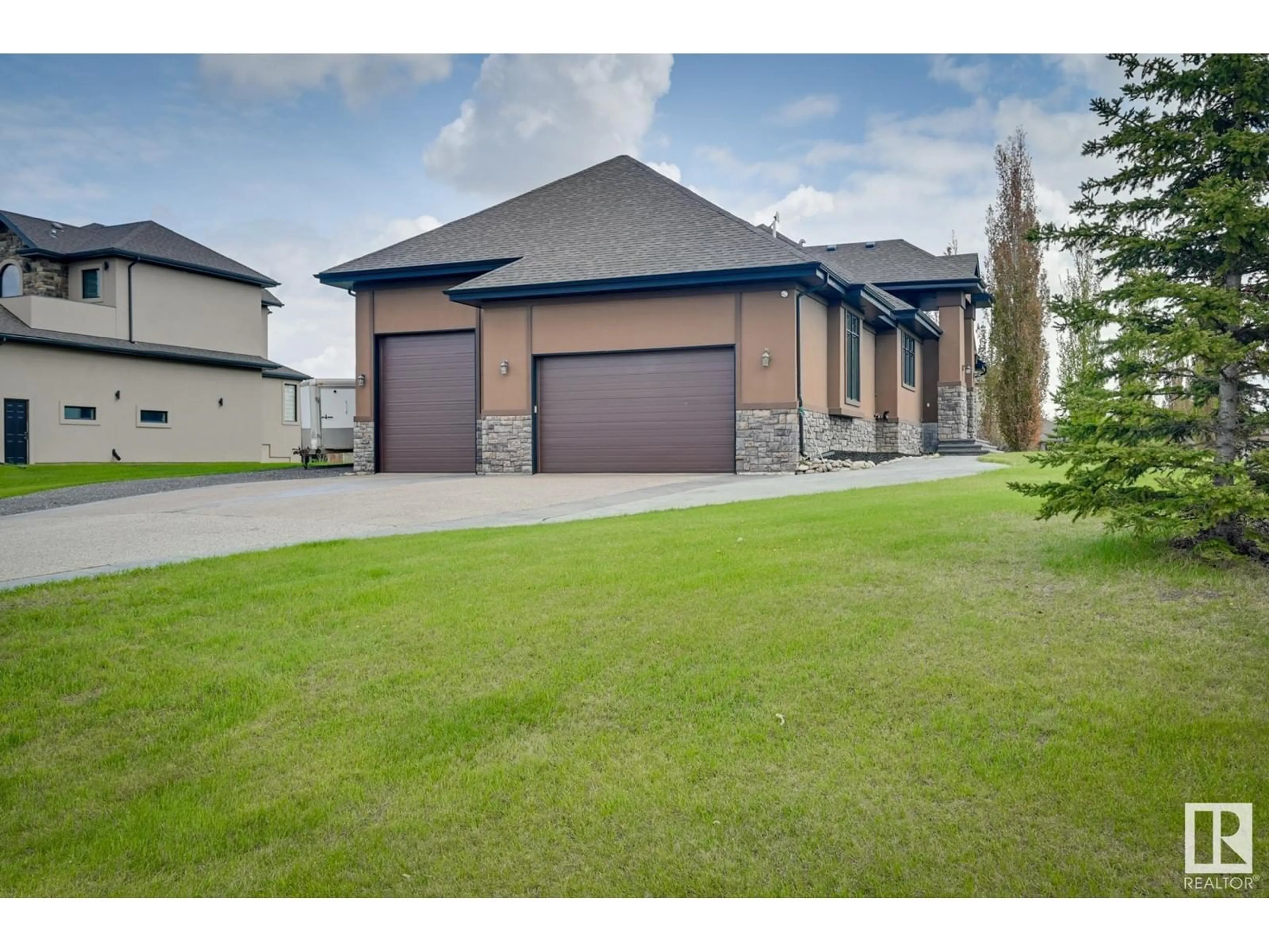 Frontside or backside of a home, the street view for #61 26131 TWP RD 532A, Rural Parkland County Alberta T7Y1A1