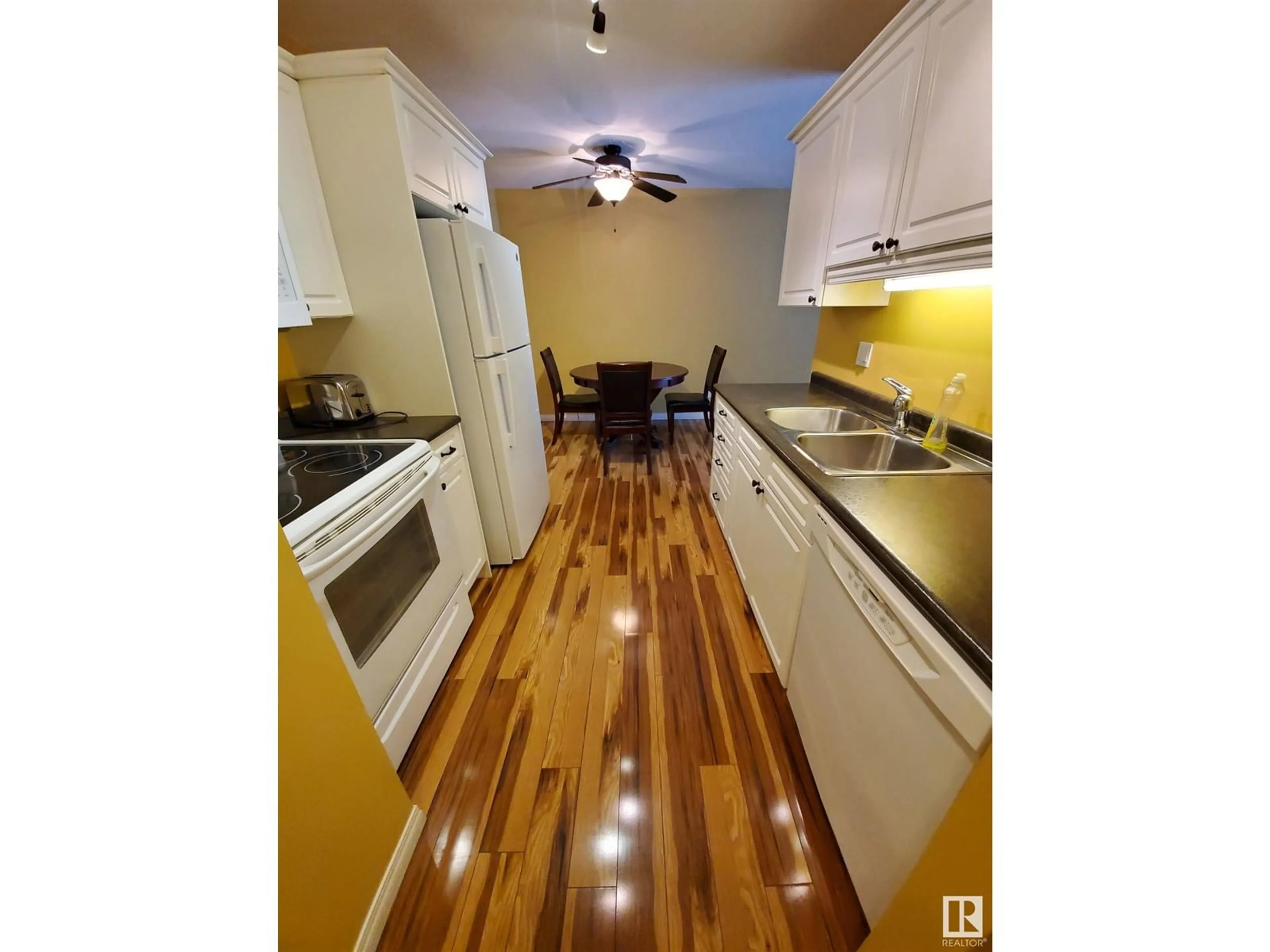 Kitchen, wood floors, cottage for #102 911 10 ST, Cold Lake Alberta T9M1J8