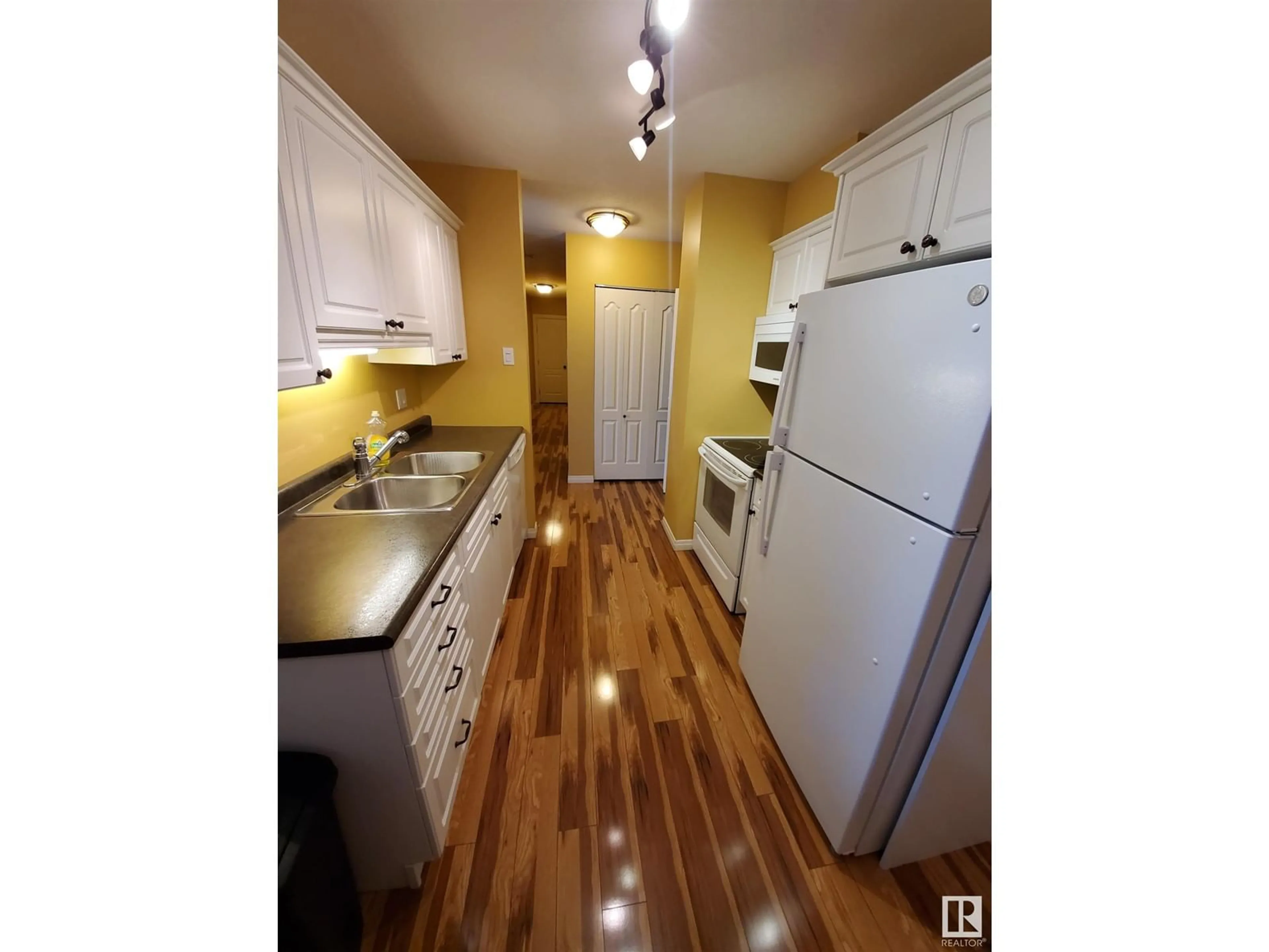 Standard kitchen, wood floors for #102 911 10 ST, Cold Lake Alberta T9M1J8