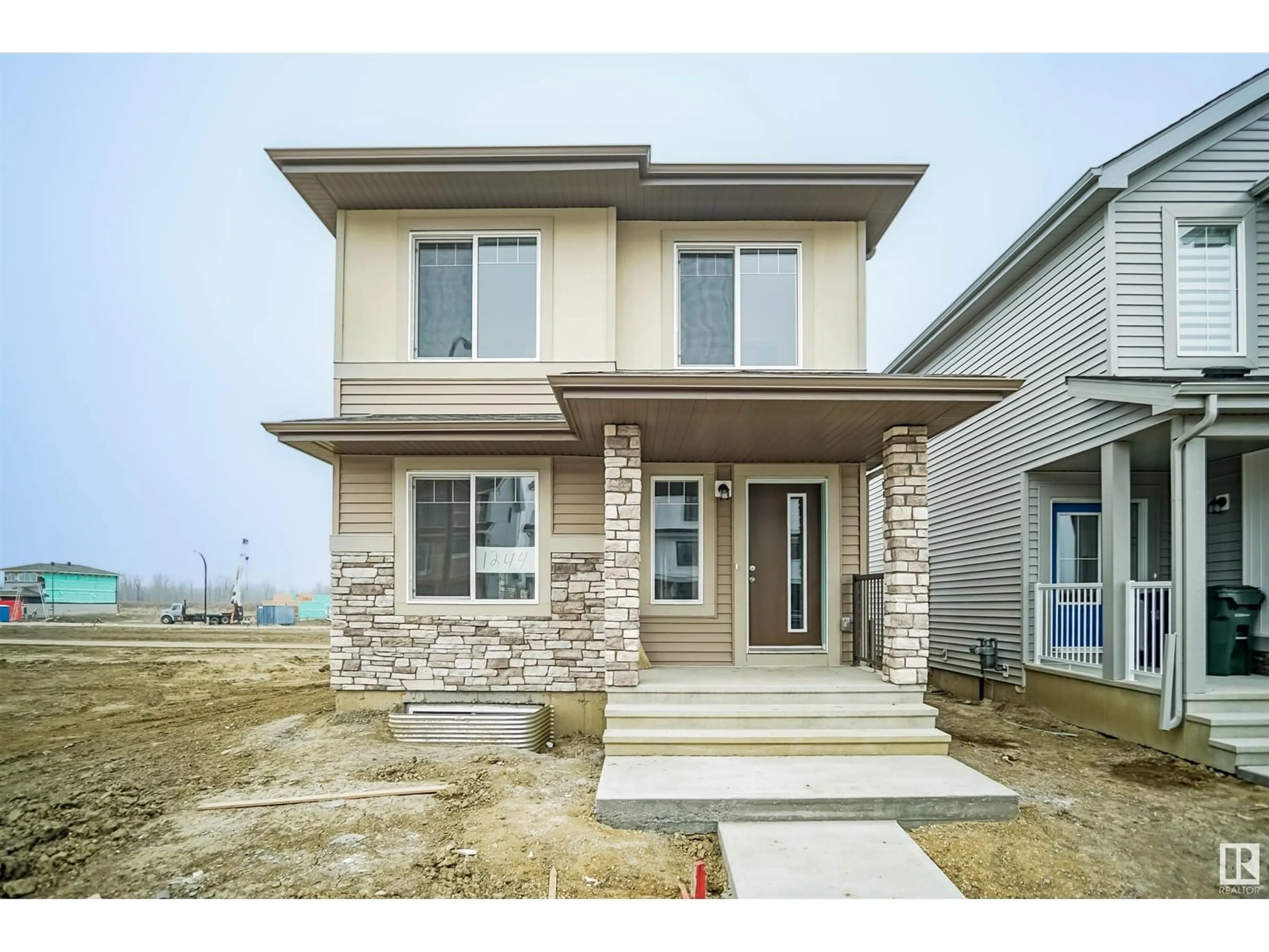 Frontside or backside of a home for 1236 MCLEOD AV, Spruce Grove Alberta T7X2Z7