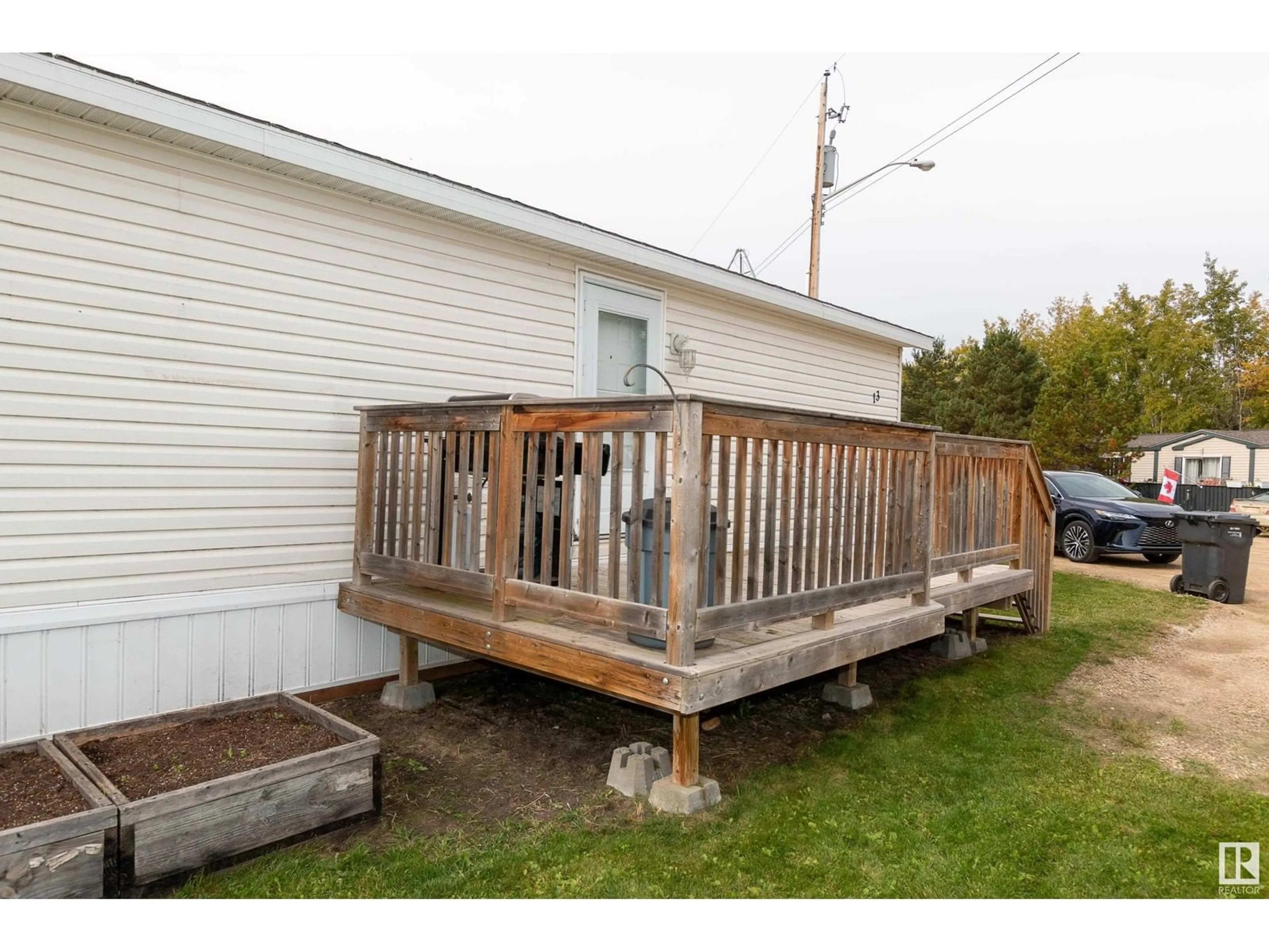 Patio, the fenced backyard for #6613 54500 Rge Rd 275, Calahoo Alberta T8R1Z1